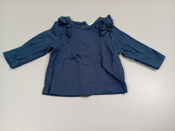 T-shirt m.l bleu marine , volants aux manches , fermeture par pressions à l'arrière