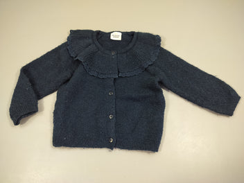 Gilet bleu marine , col dentelle . Bouloché 46% ac.r.ylique 31% polyamide 20% polyester 3% élasthanne