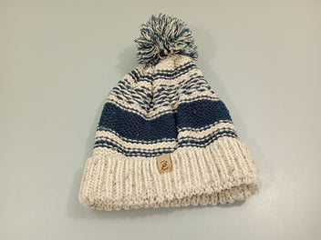 Bonnet beige et bleu marine avec pompon, un peu bouloché