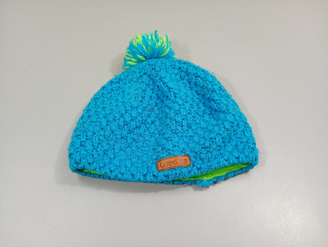 Bonnet Wed'ze tricot bleu chiné avec pompon , bleu et vert un peu bouloché, moins cher chez Petit Kiwi