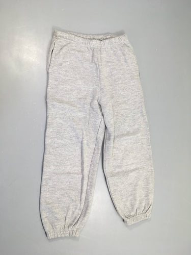 Pantalon de training gris chiné, légèrement bouloché, moins cher chez Petit Kiwi