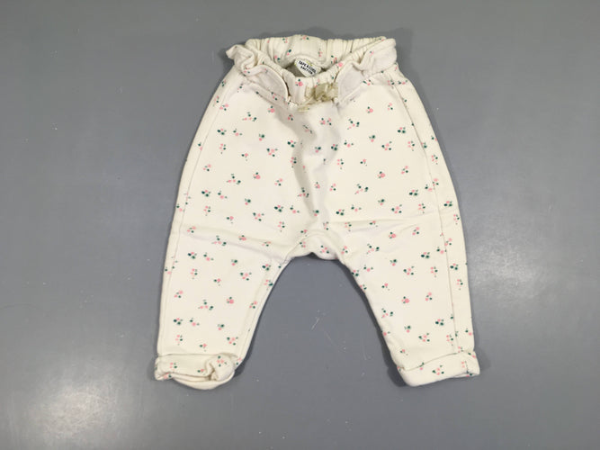 Pantalon molleton à revers blanc fleuri, moins cher chez Petit Kiwi