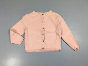 Gilet rose pâle légèrement bouloché