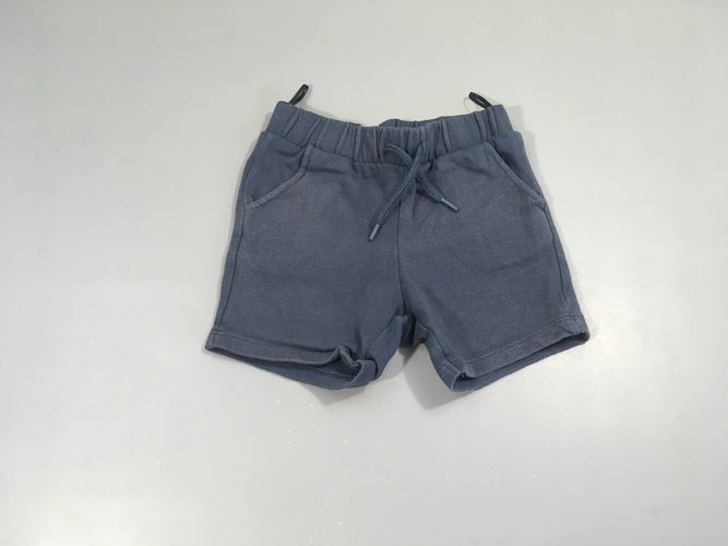 Short molleton bleu légèrement décoloré, moins cher chez Petit Kiwi