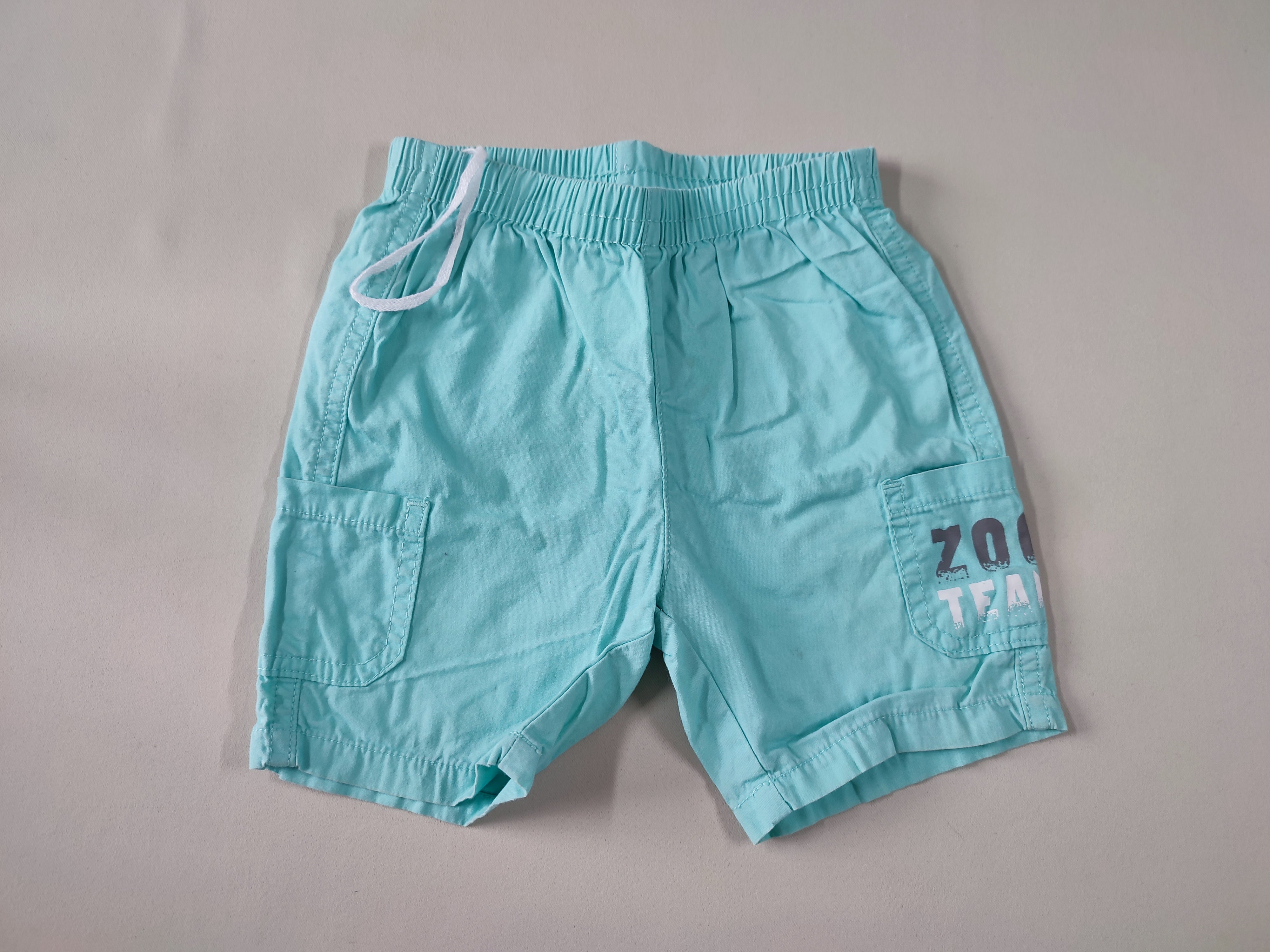 Bermuda toile turquoise poches latérales