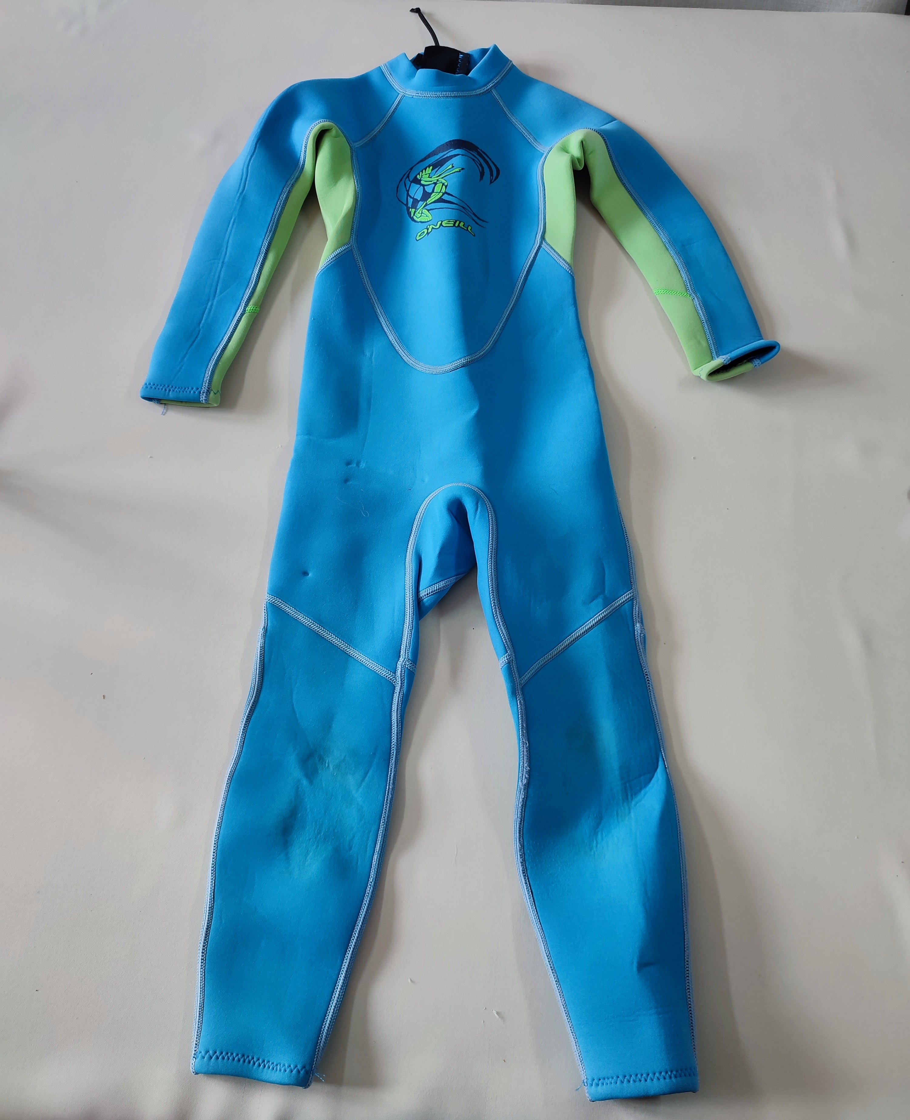 Combinaison longue anti-uv anti-froid bleue/verte (usée aux genoux)