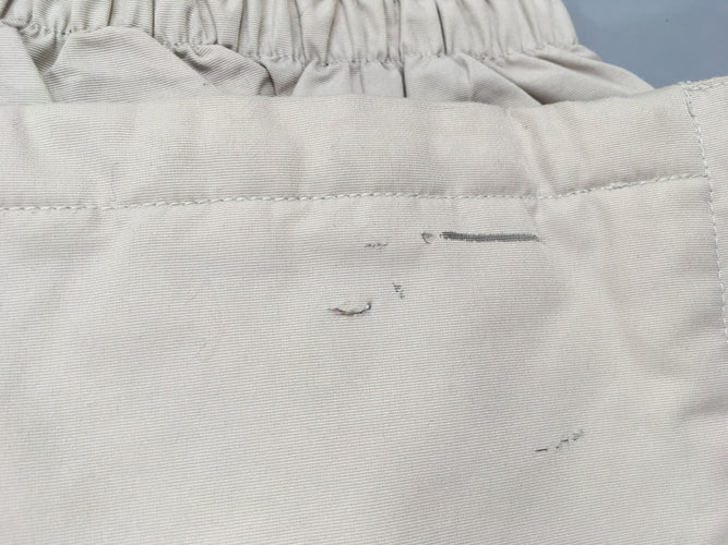 Pantalon de ski beige ceinture Dorotennis T2, accrocs dans le bas, moins cher chez Petit Kiwi