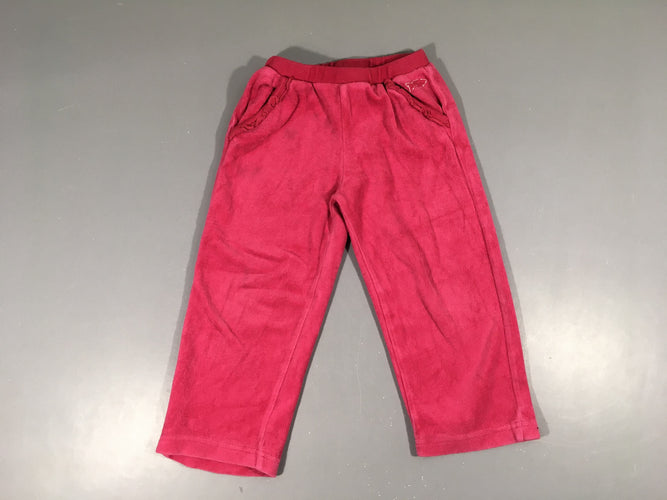 Pantalon de training velours ras rose vif, légèrement bouloché, moins cher chez Petit Kiwi