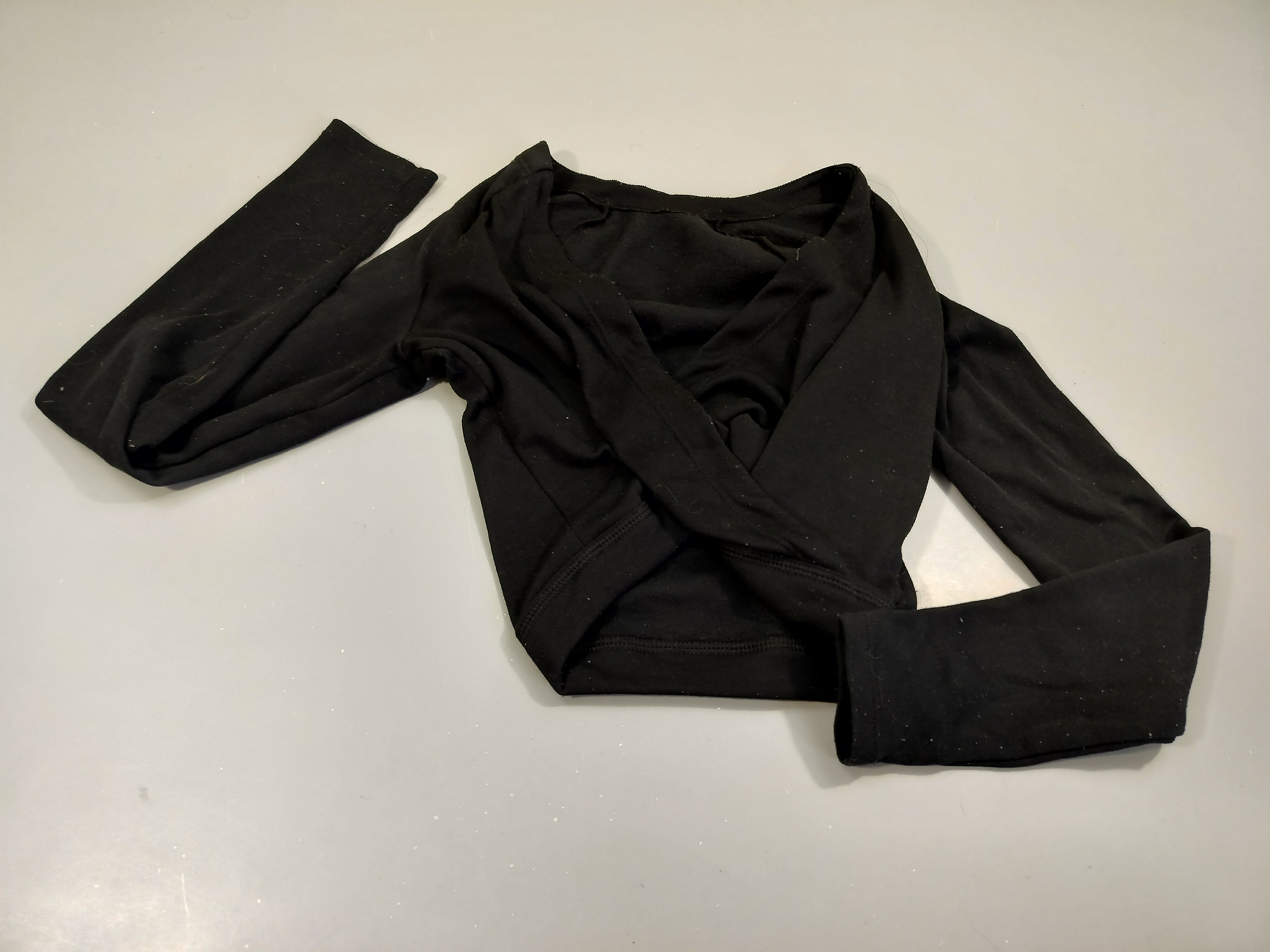 Gilet cache-coeur court de danse noir.