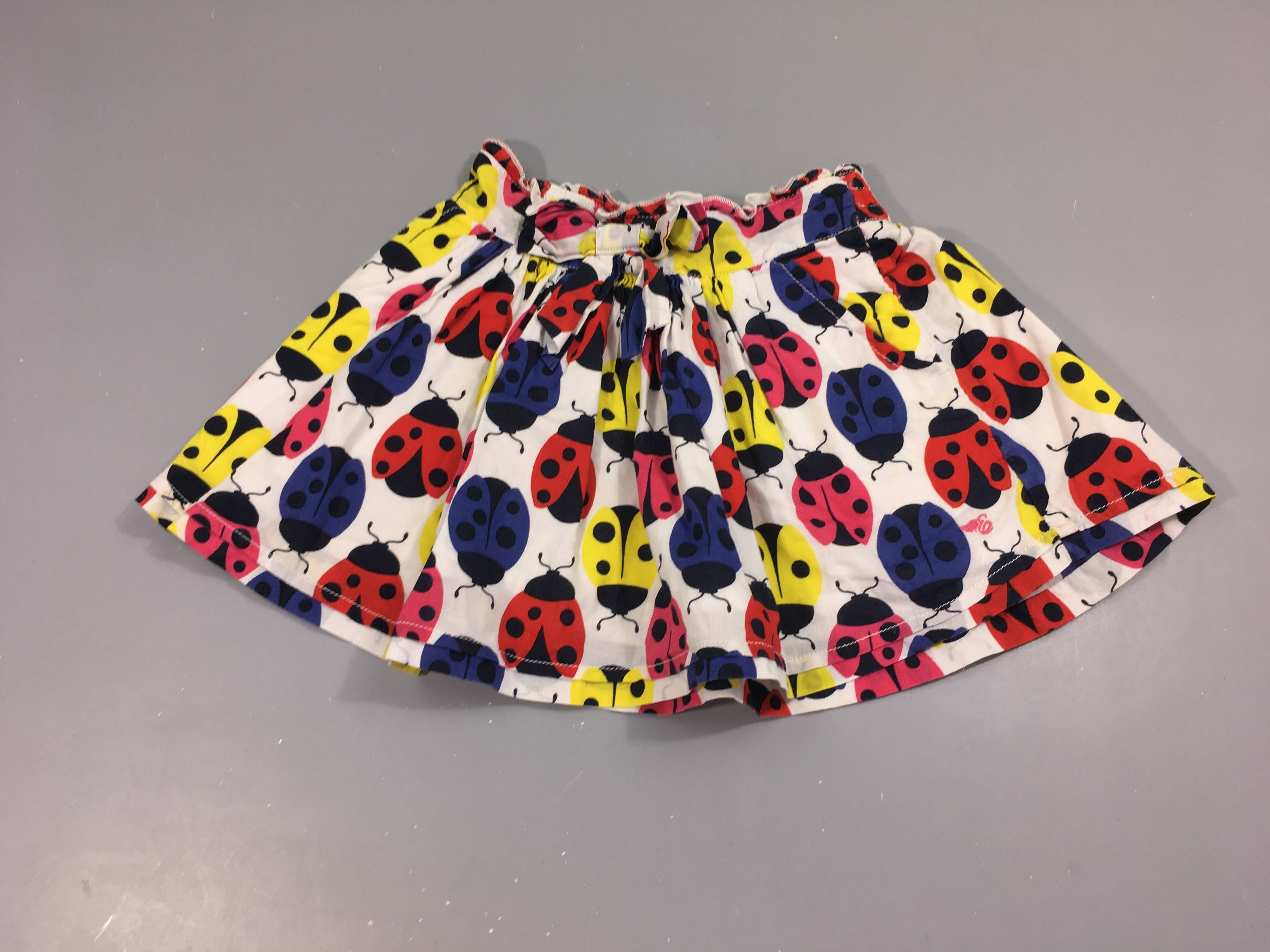 Jupe blanche coccinelles couleur poches et doublée