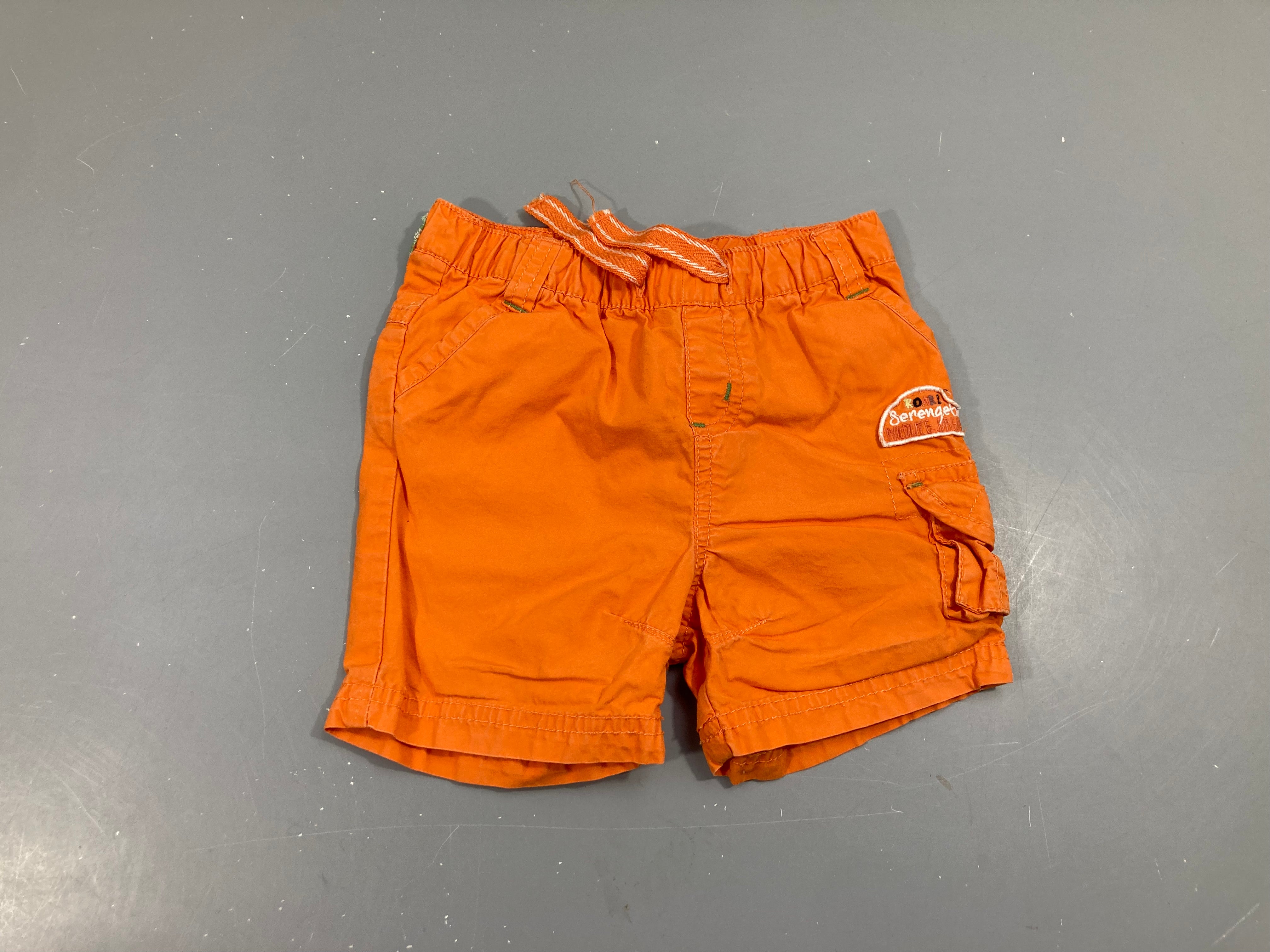 Bermuda orange poche latérale