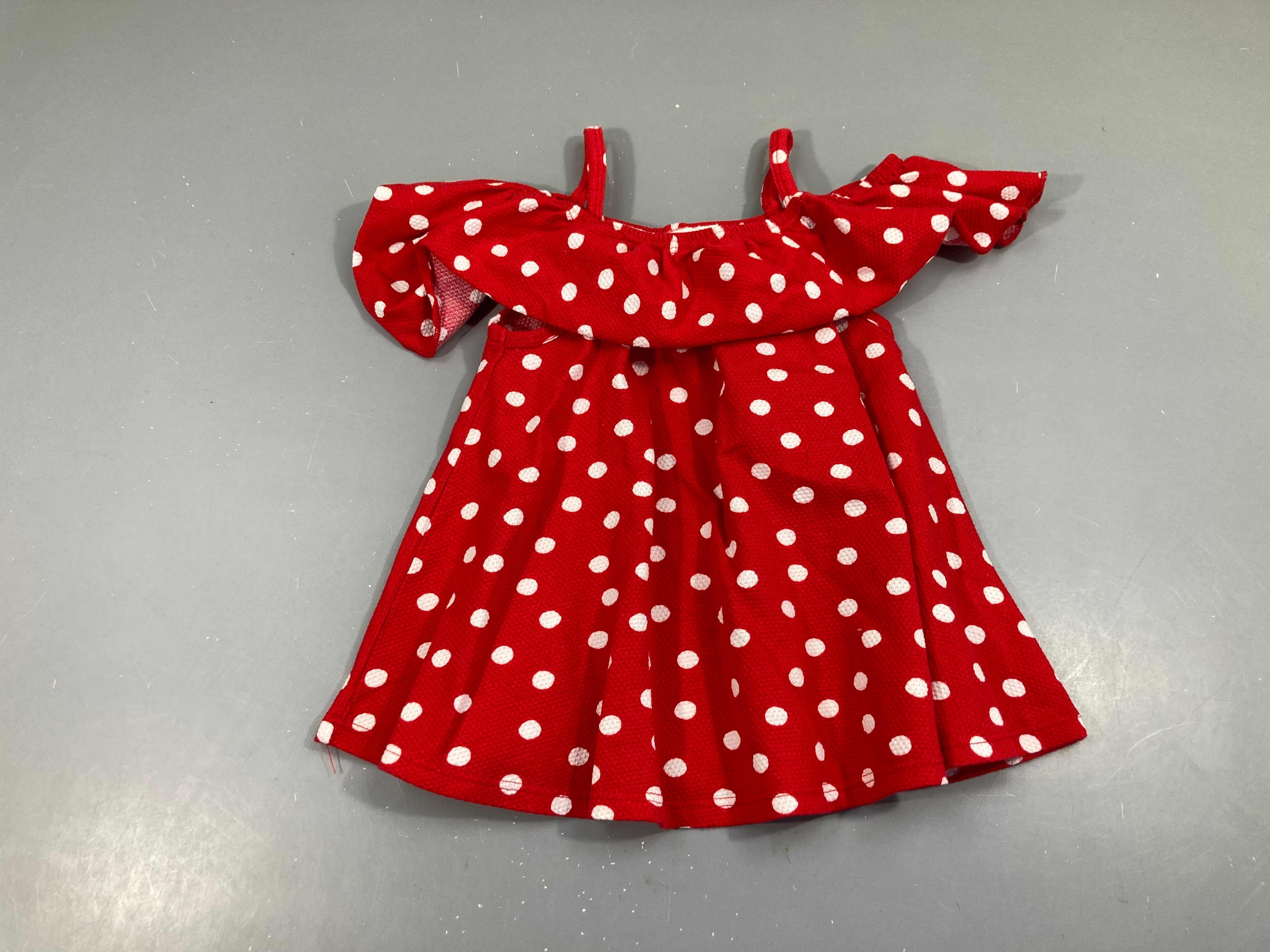 Blouse texturée épaules dégagée rouge ois blancs