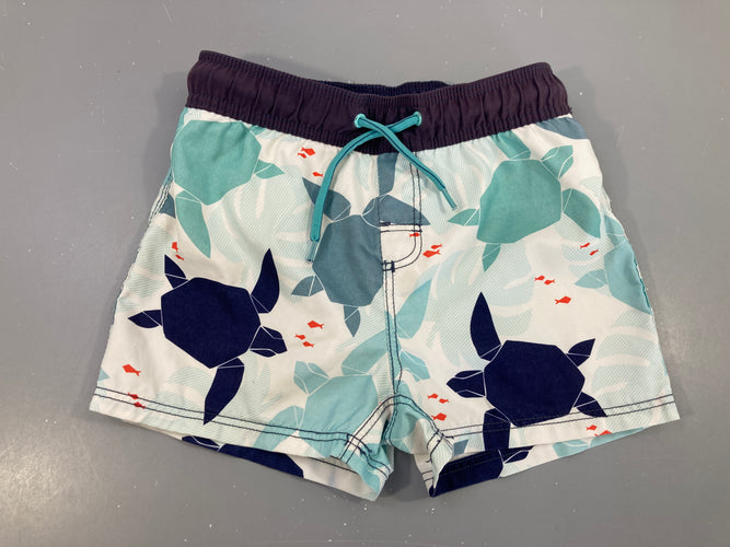Maillot short blanc tortues géométriques vertes et bleues Légèrement souillé arrière, moins cher chez Petit Kiwi