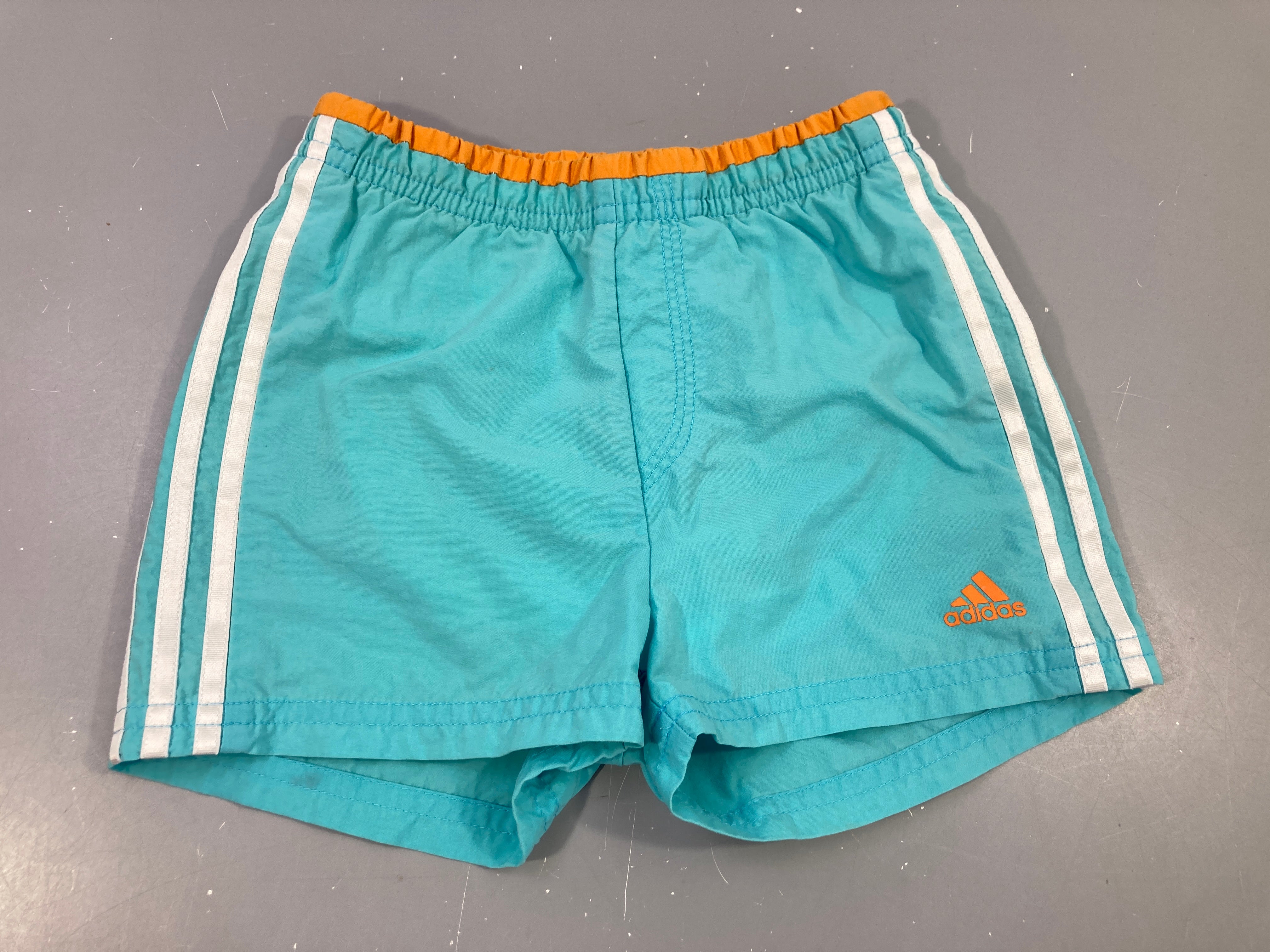 Maillot short turquoise -orange Adidas-Poche un peu découse