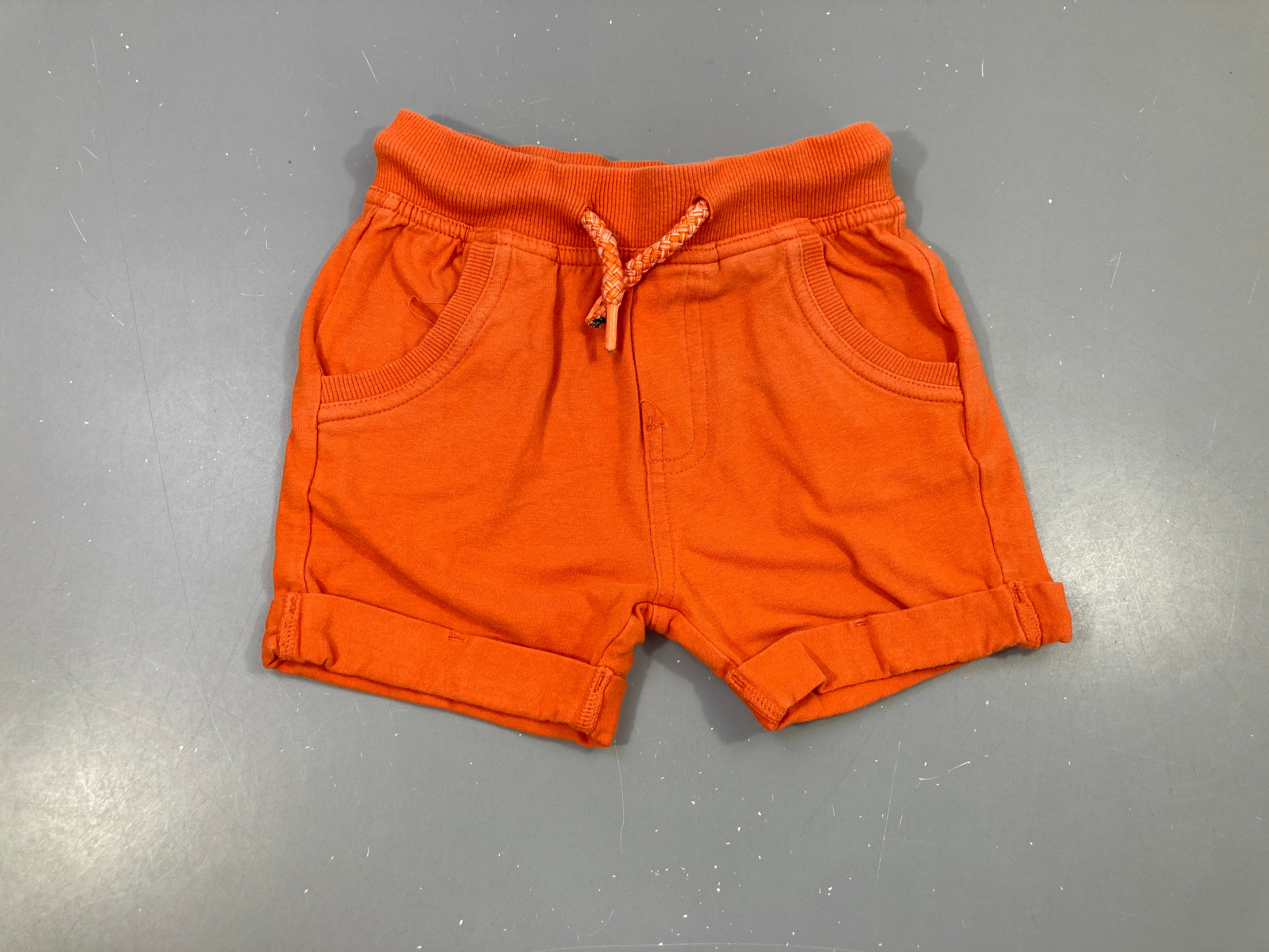 Bermuda molleton orange à revers