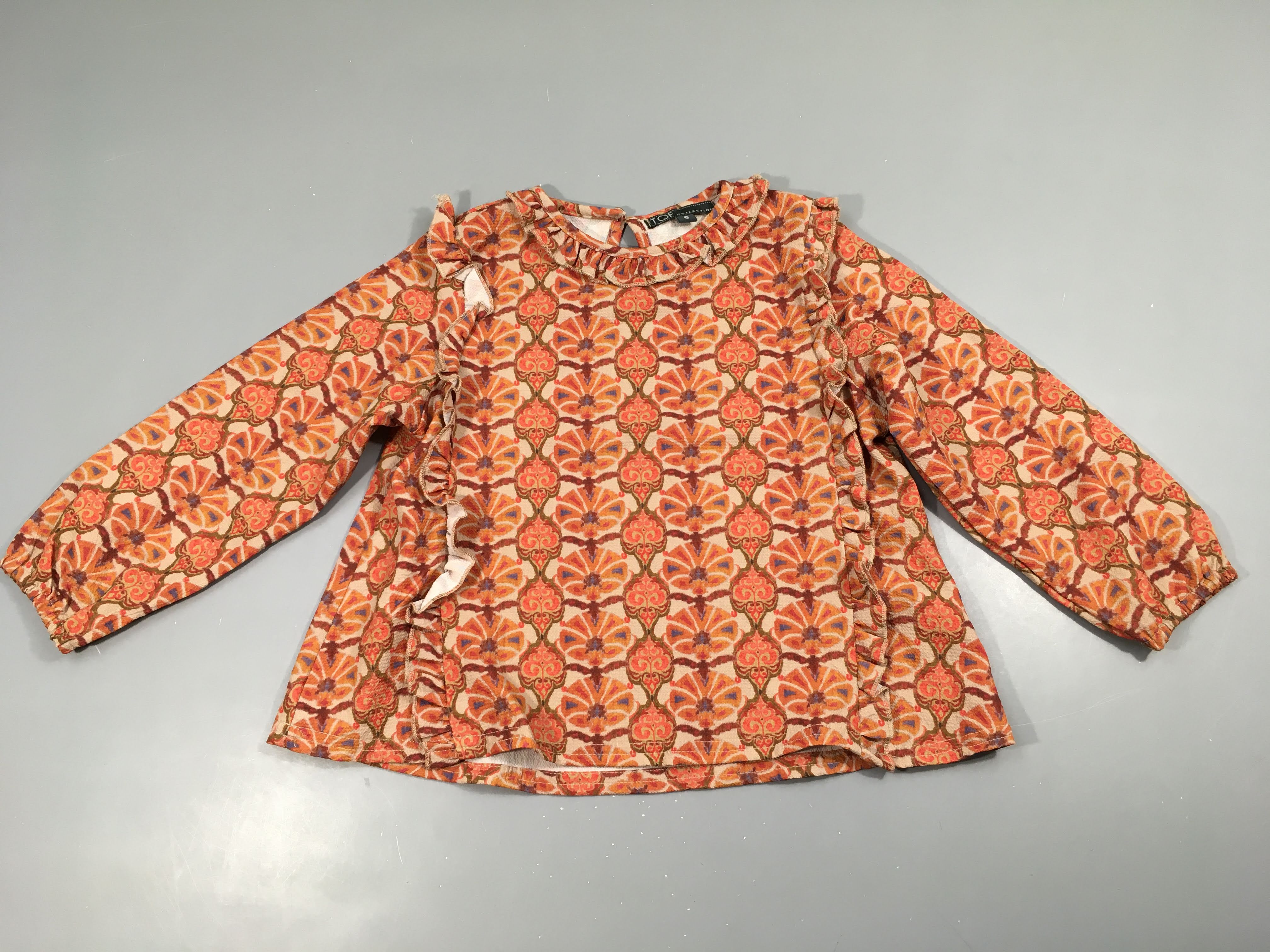 Blouse beige motifs oranges