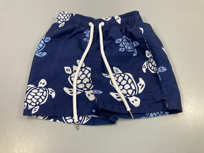 Maillot short bleu marine, tortues blanches , pas de taille indiquée, estimée 2 ans, moins cher chez Petit Kiwi