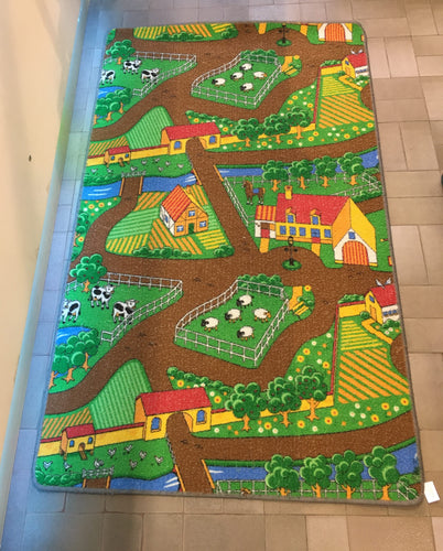 Tapis de jeux réversible ville/campagne, côté campagne bouloché, moins cher chez Petit Kiwi