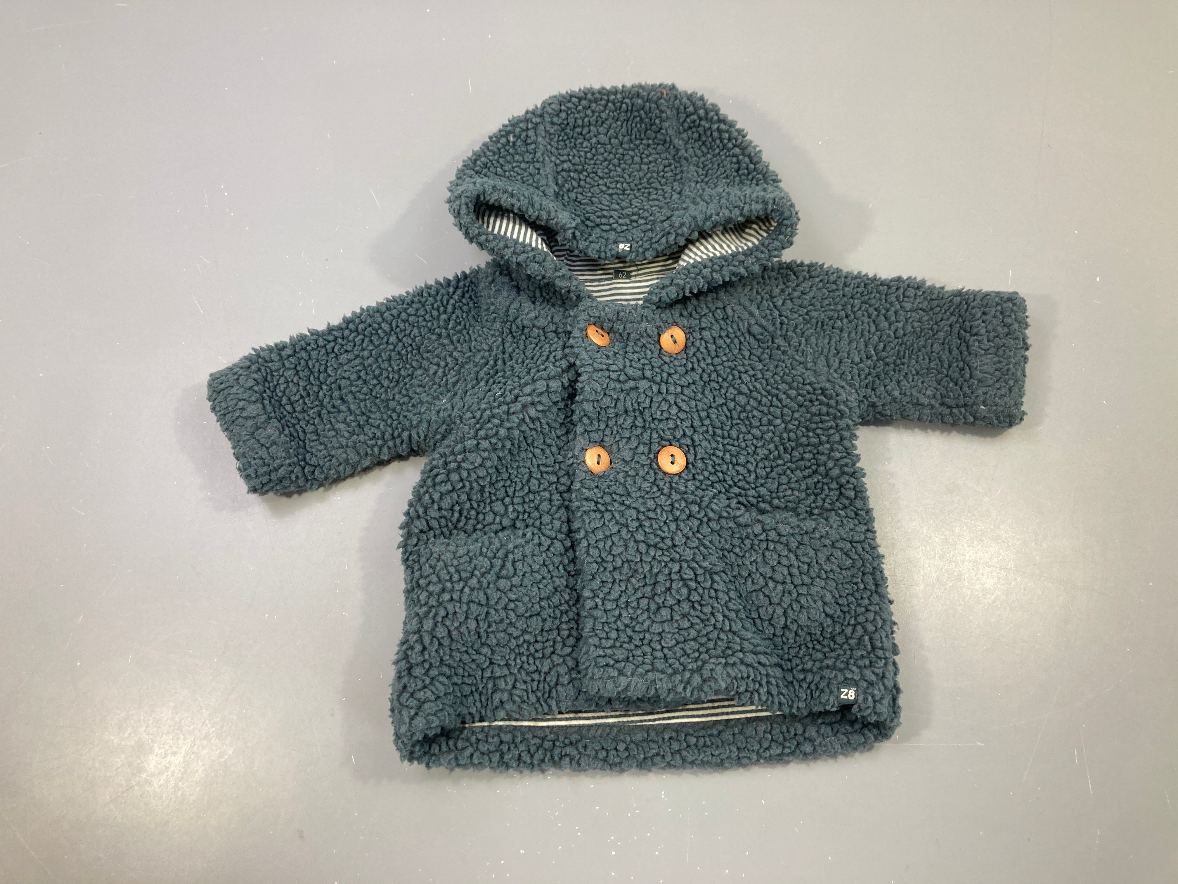 Veste teddy bleu/vert à capuche