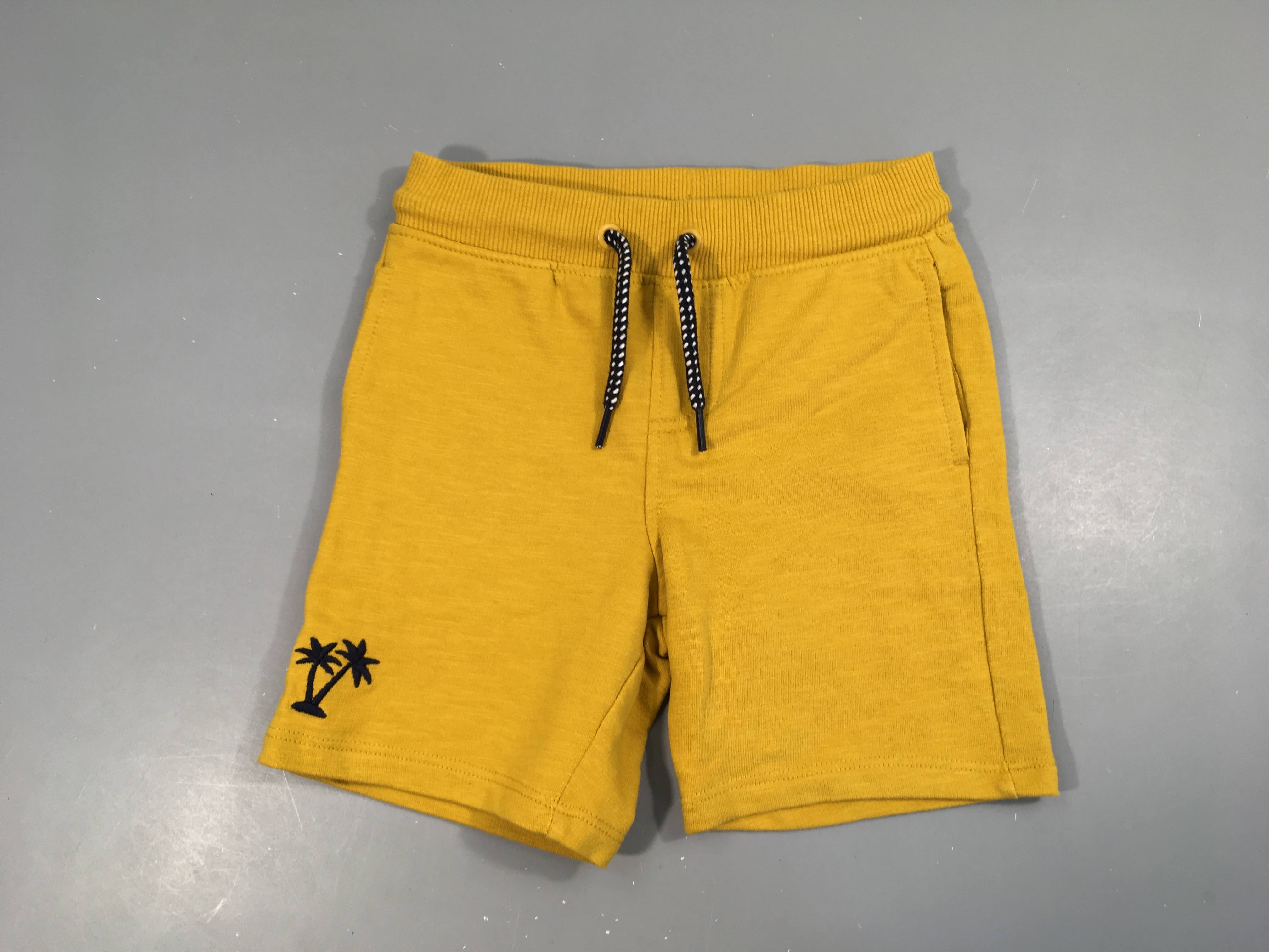 Bermuda molleton orange flammé palmiers