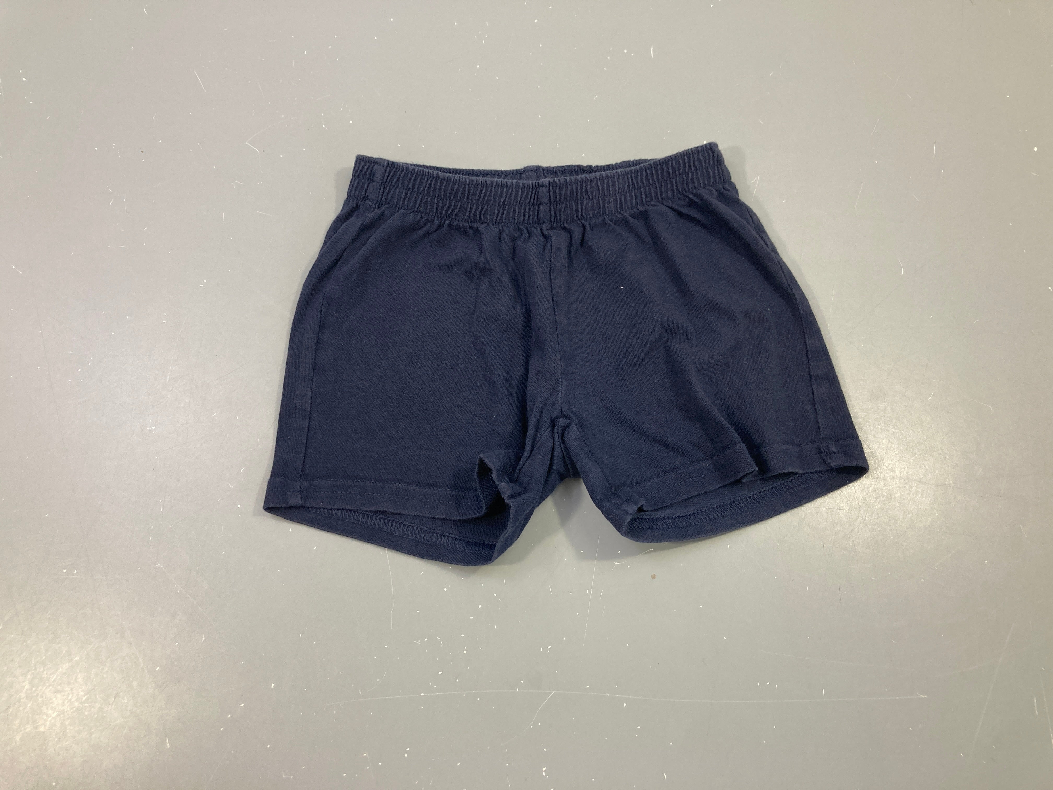Short jersey bleu foncé (taille estimée, pas d'étiquette)