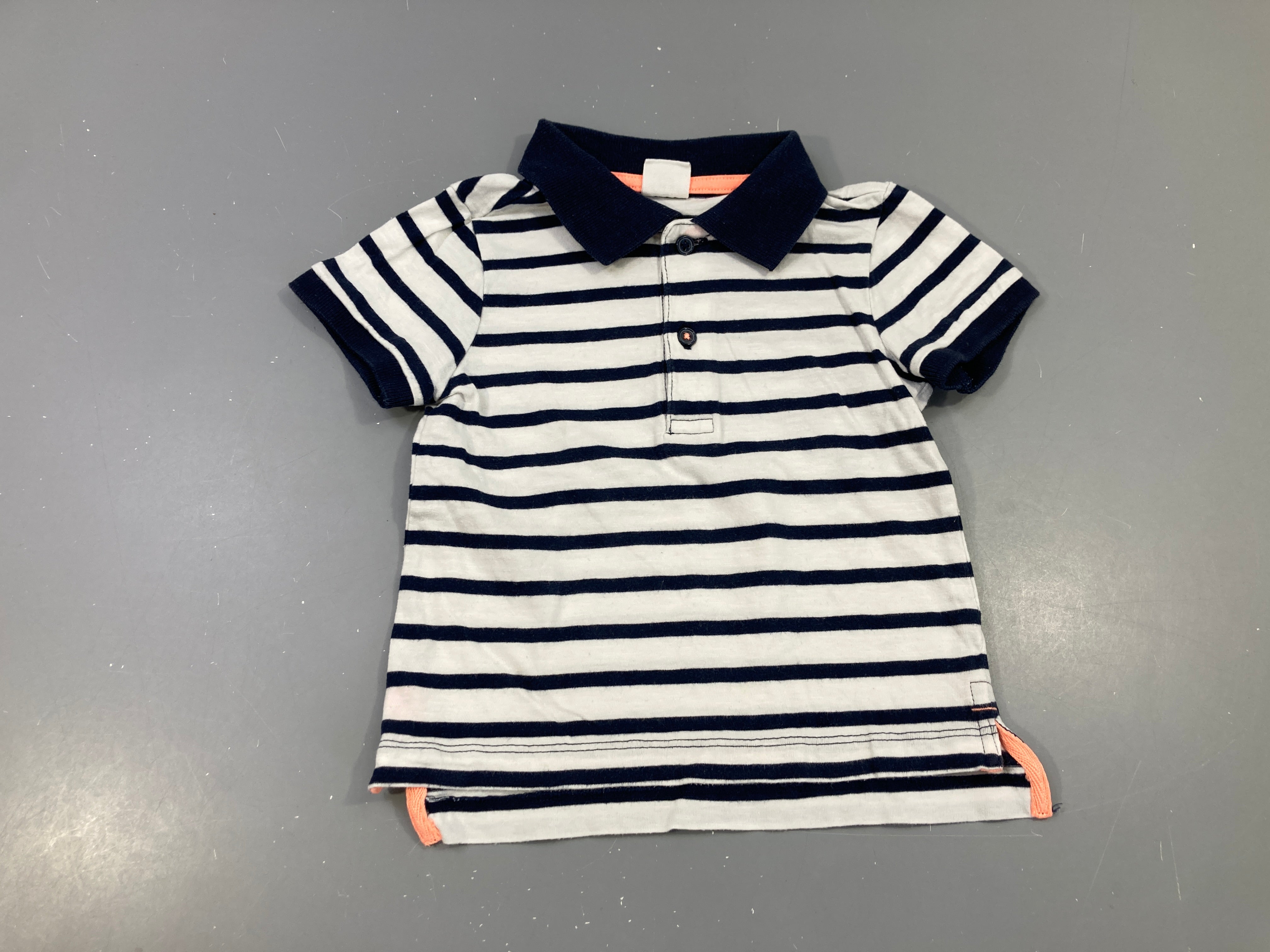 Polo m.c jersey blanc rayé bleu foncé légèrement bouloché