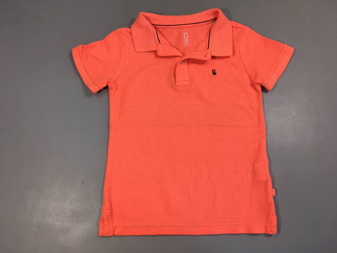 Polo m.c saumon néon, légèrement boulochée, moins cher chez Petit Kiwi