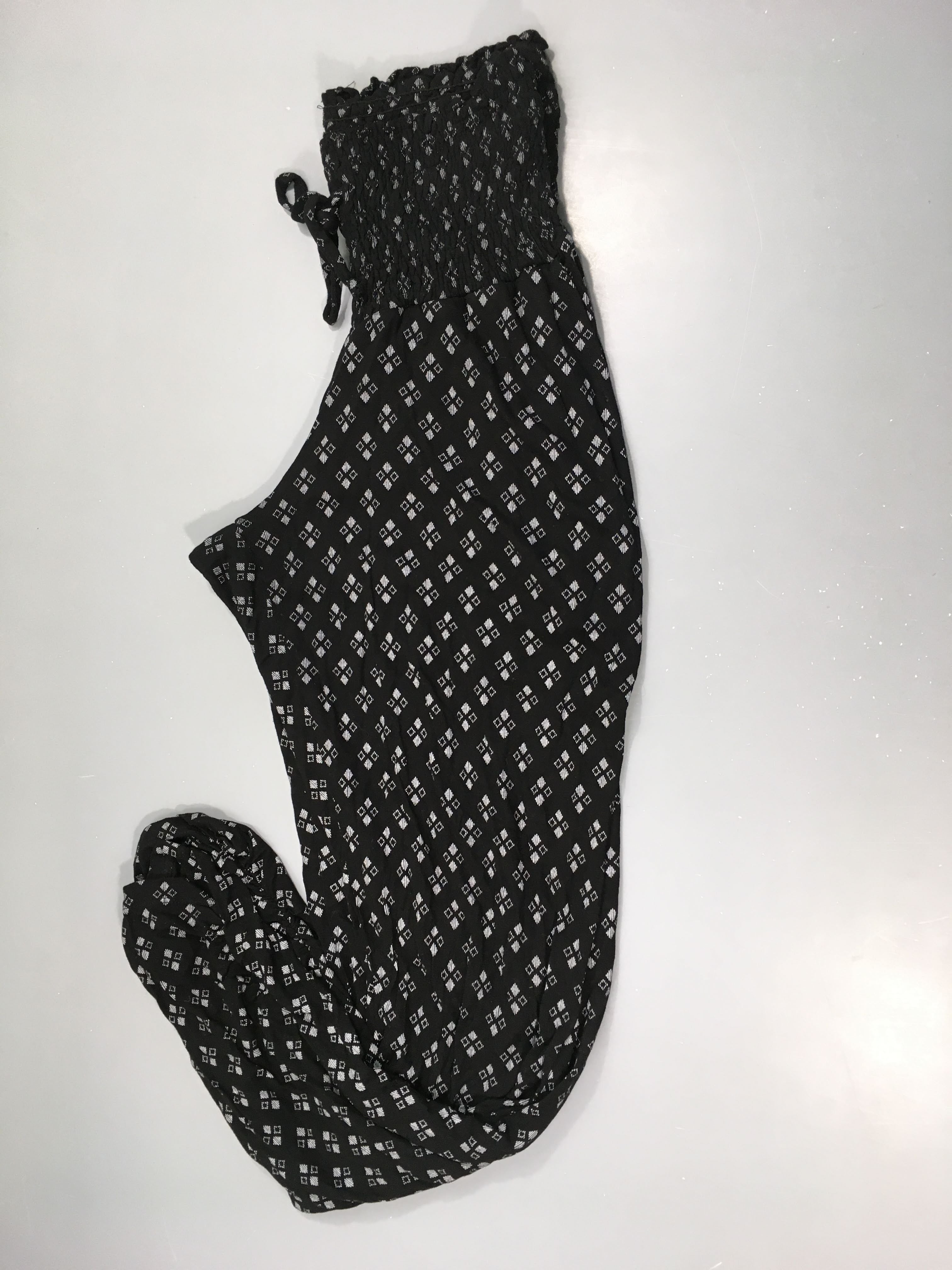 Pantalon fluide noir motifs