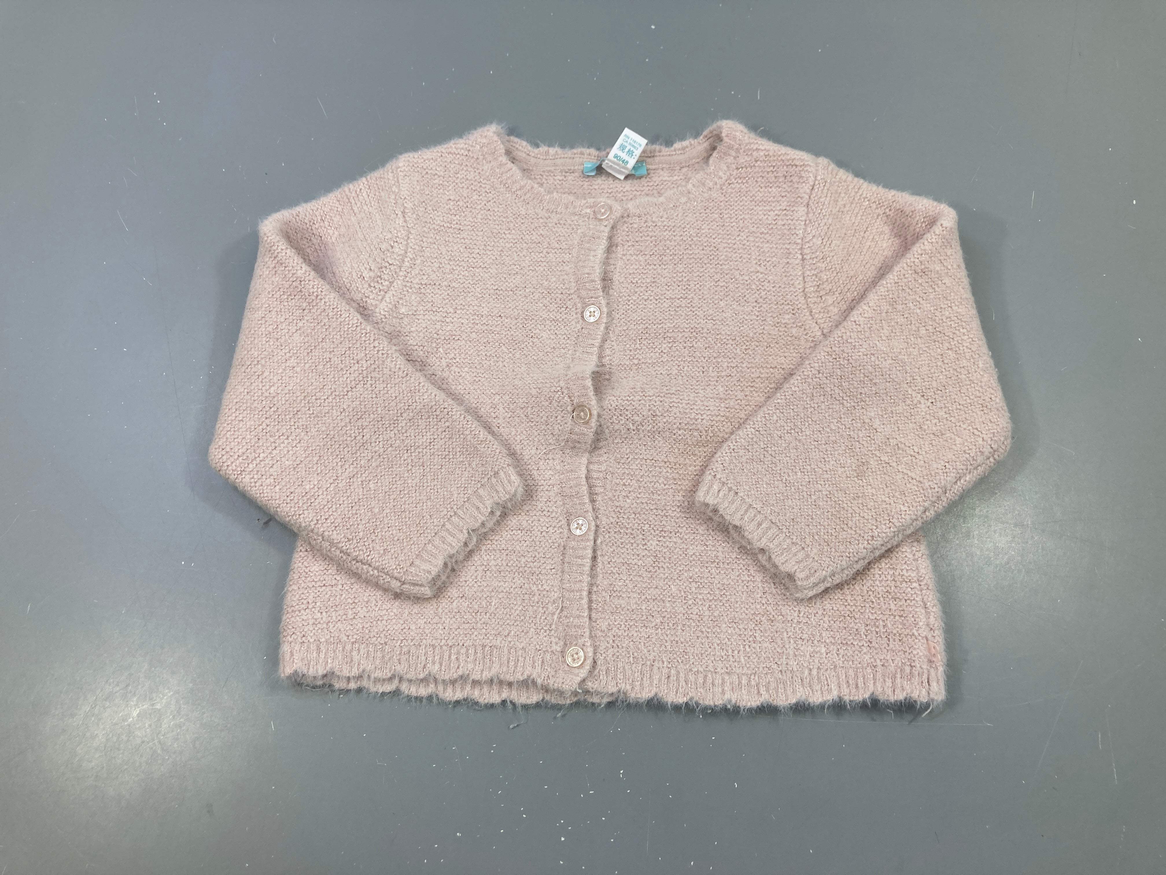 Gilet duveteux rose pâle fil irisé