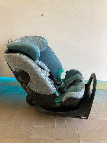 Siège auto évolutif Chicco Bi Seat i-Size Air Teal melange + Base 360° i-Size-Légères auréoles coté appuie-tête et coussinet ceinture & Légèrement bouloche fin assise., moins cher chez Petit Kiwi