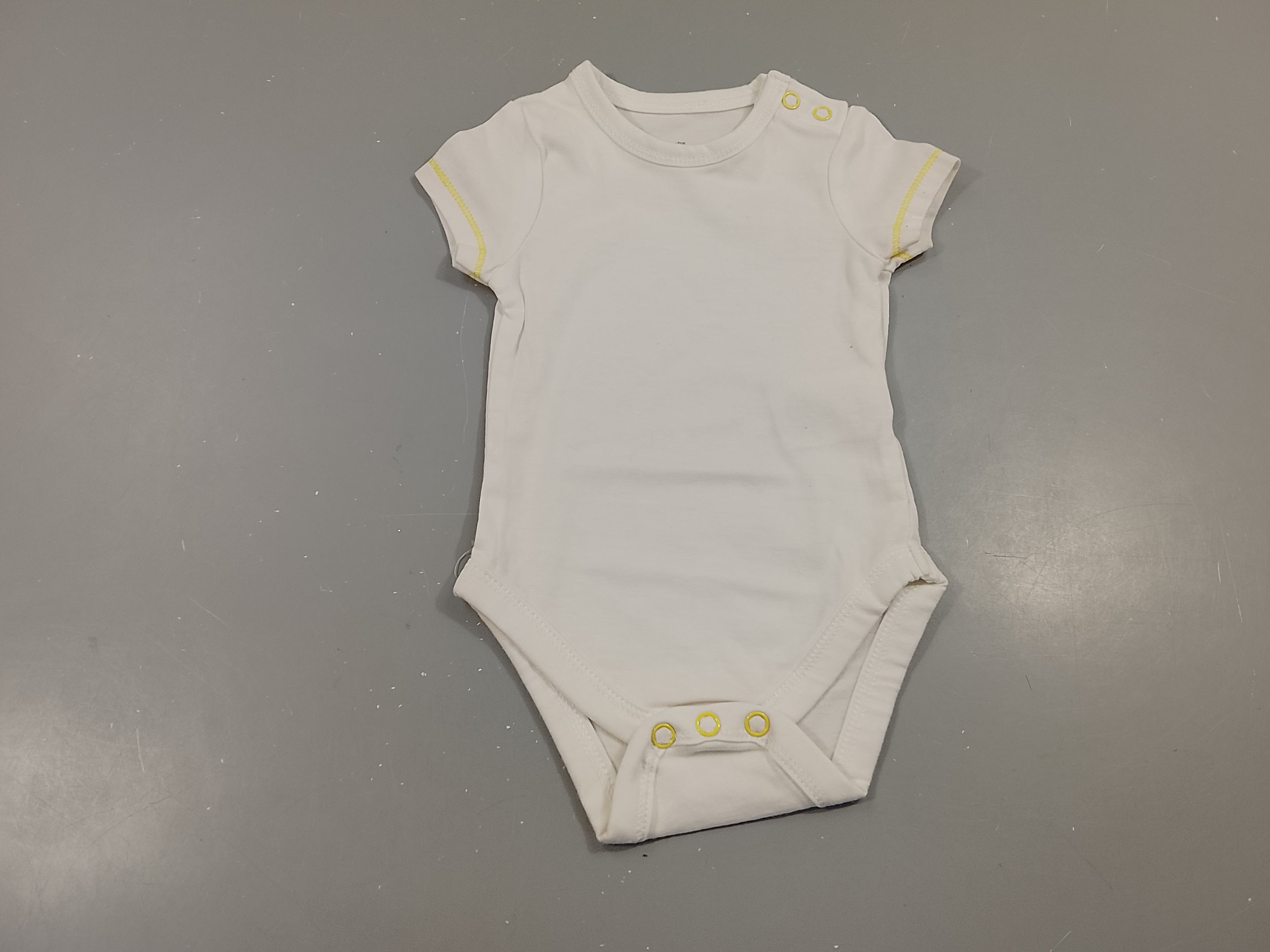 Body m.c blanc , jaune