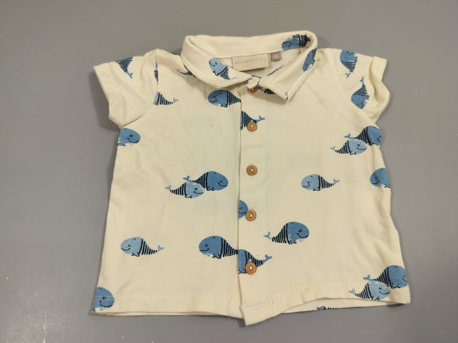 Polo m.c jersey  boutonné beige clair motifs poissons, petite tache sur le dessus  95% coton 5% élasthanne, moins cher chez Petit Kiwi