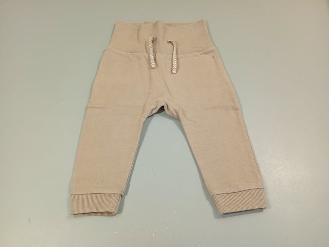 Pantalon molleton gris , taille et chevilles élastiques, moins cher chez Petit Kiwi