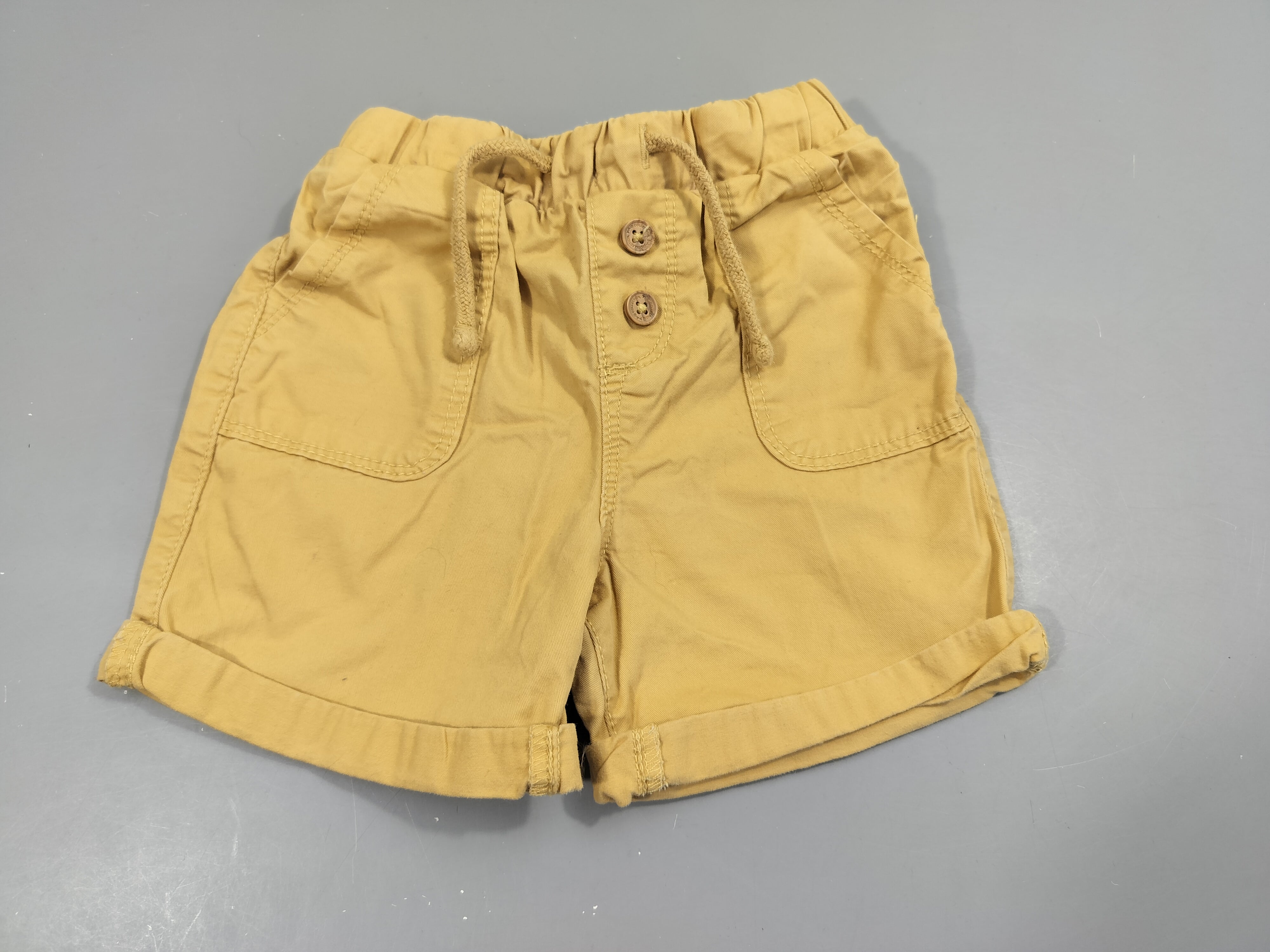 Short toile  jaune à revers 100% coton