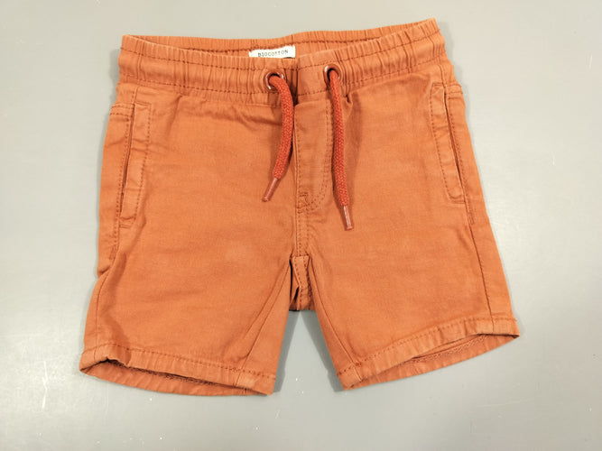Short orange, moins cher chez Petit Kiwi