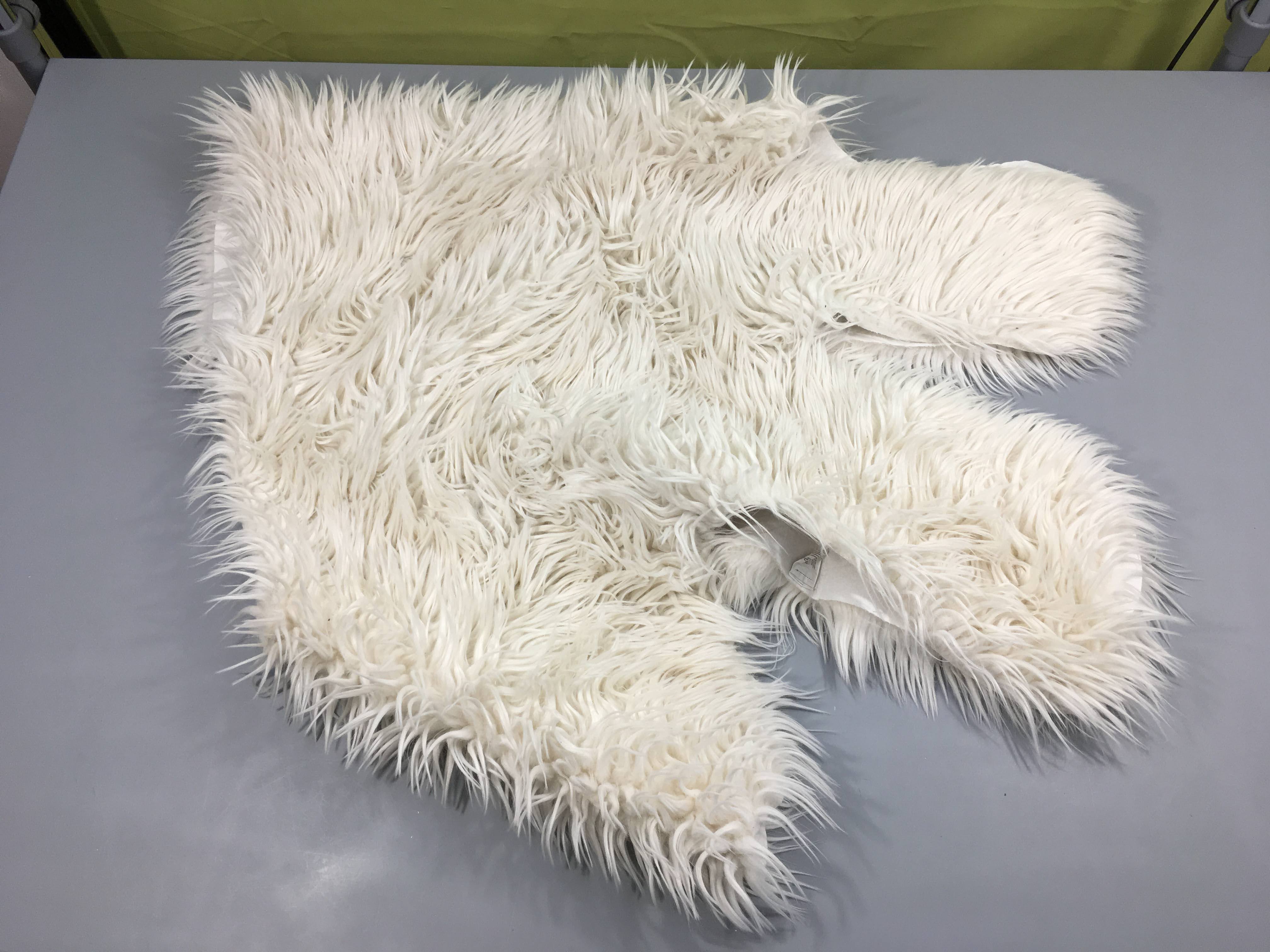Tapis peluche ours blanc