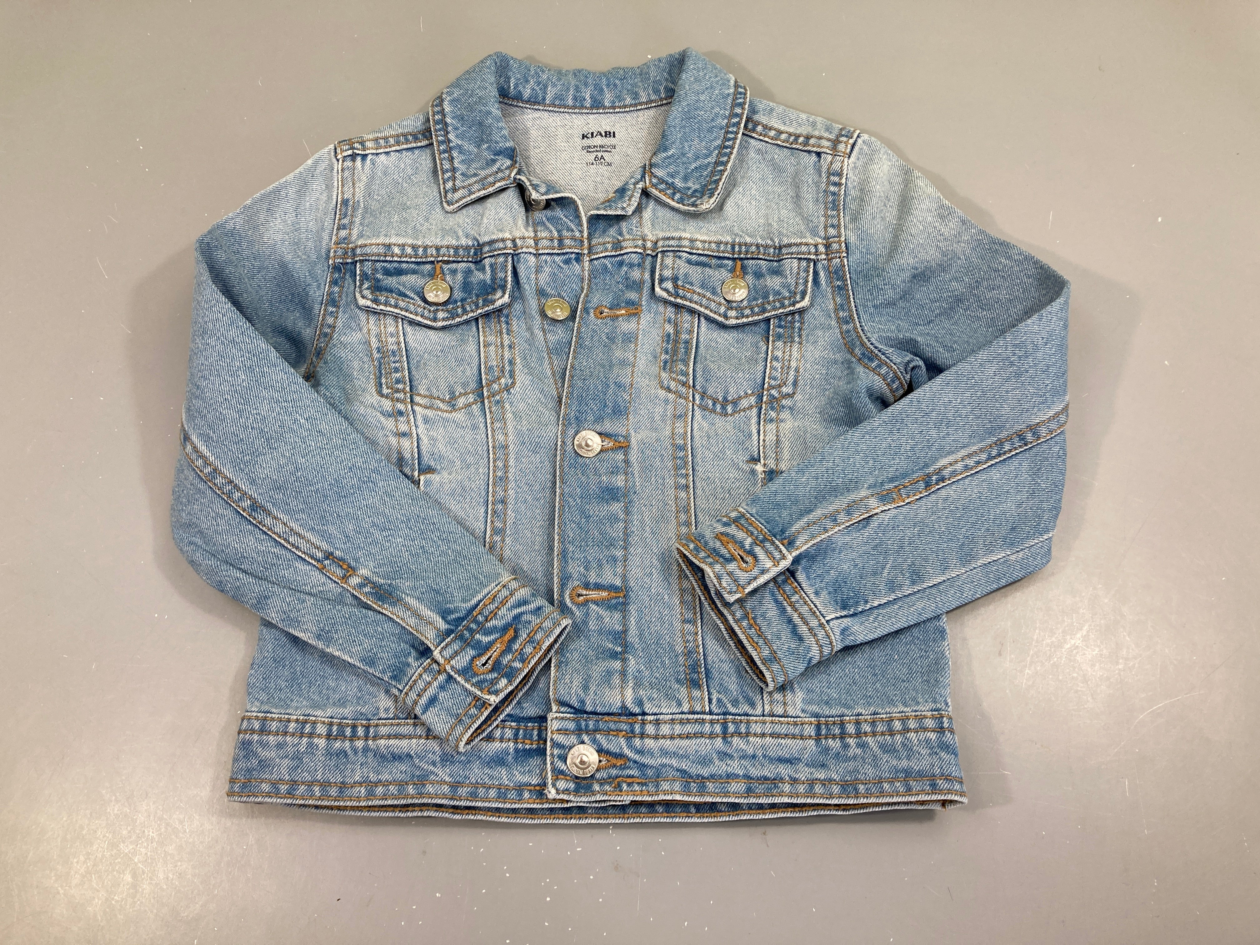 Veste en jean haut poche G usé