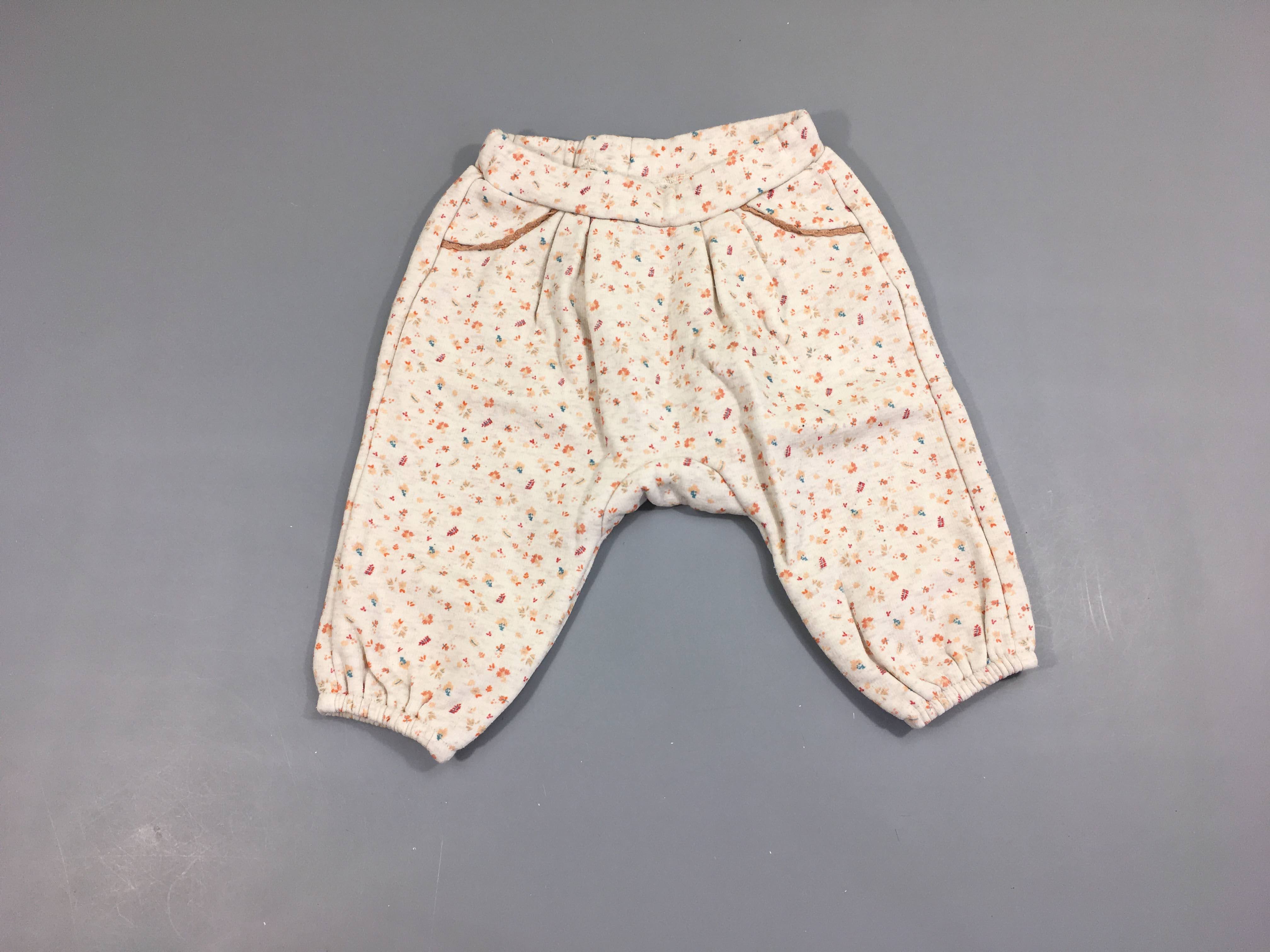 Pantalon molleton beige petits motifs orangés