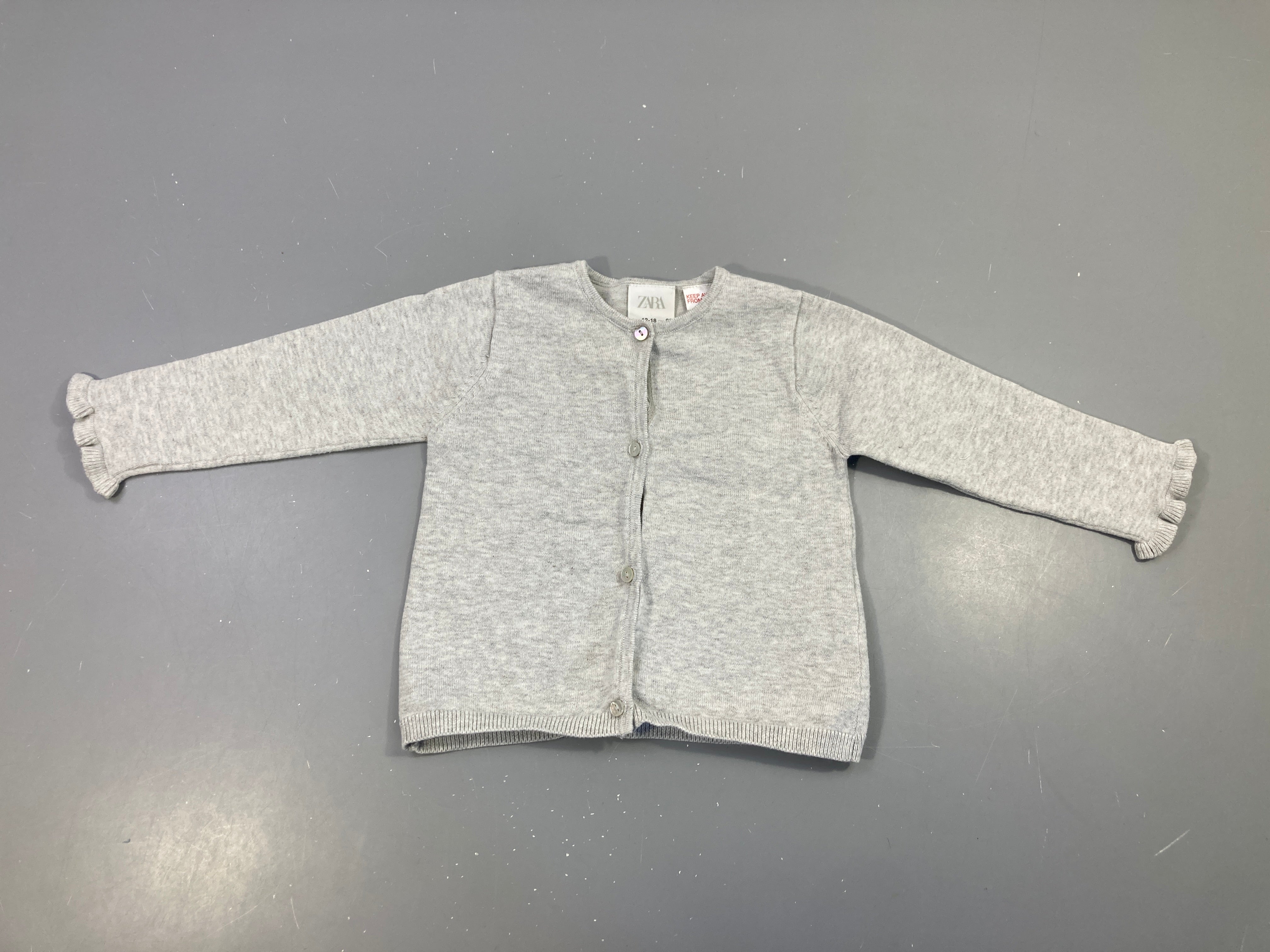 Gilet gris froufrou bas manches