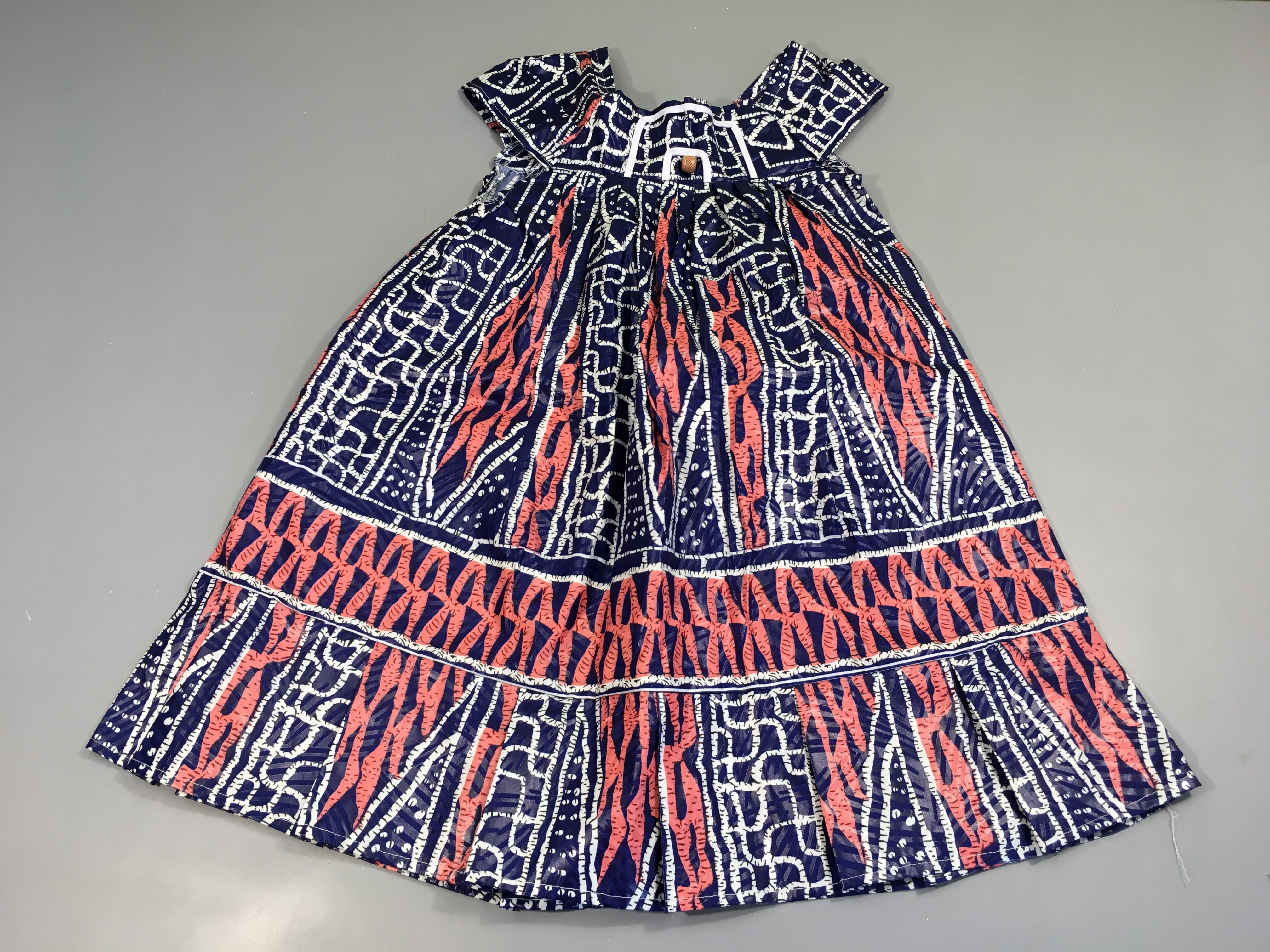 Robe m.c enduite motifs bleu/rose/blanc perles bois