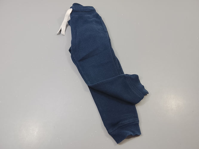Pantalon jogging bleu marine taille et chevilles élastiques, un peu bouloché, moins cher chez Petit Kiwi