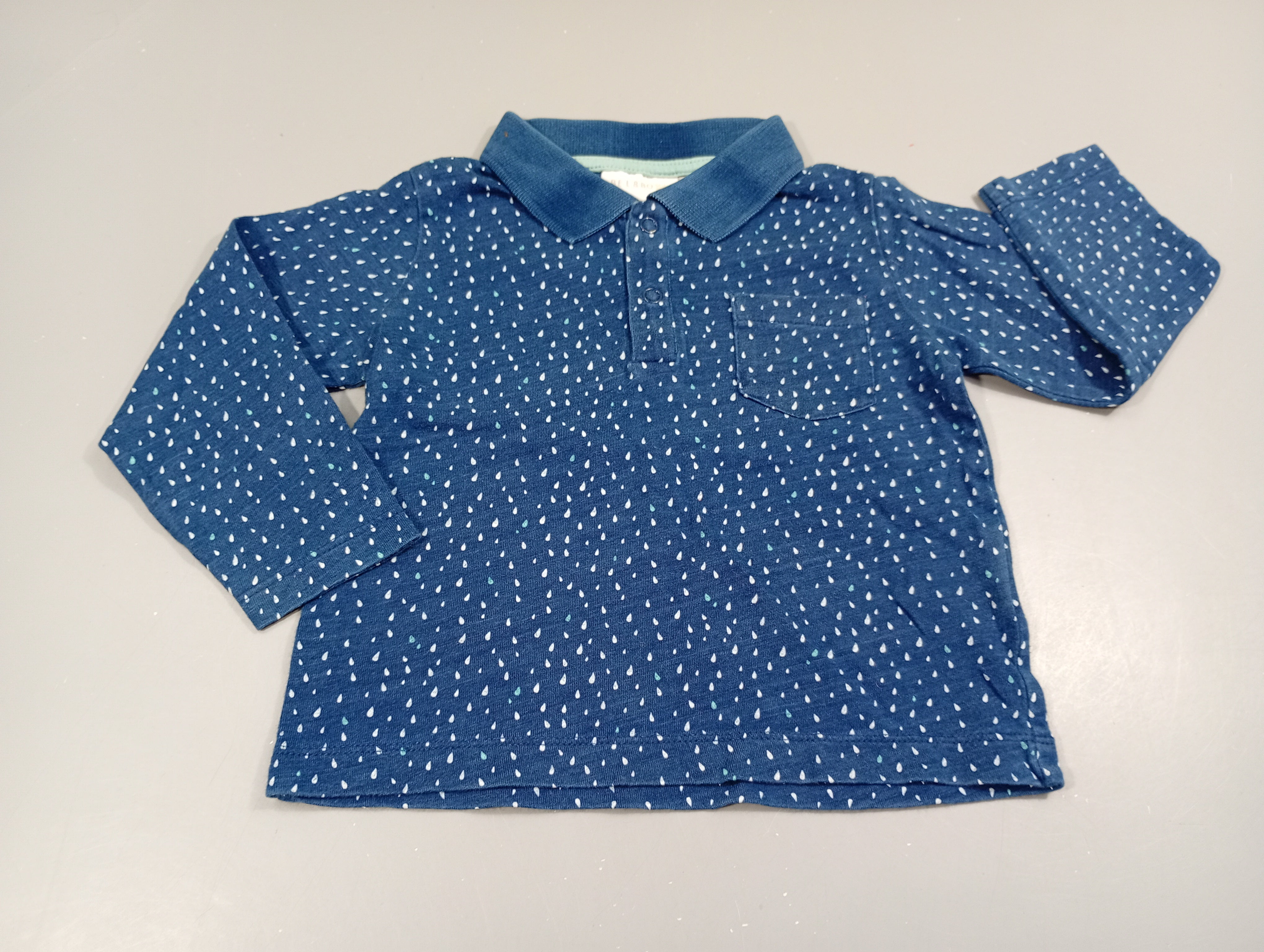 Polo jersey bleu chiné,mini gouttes blanches