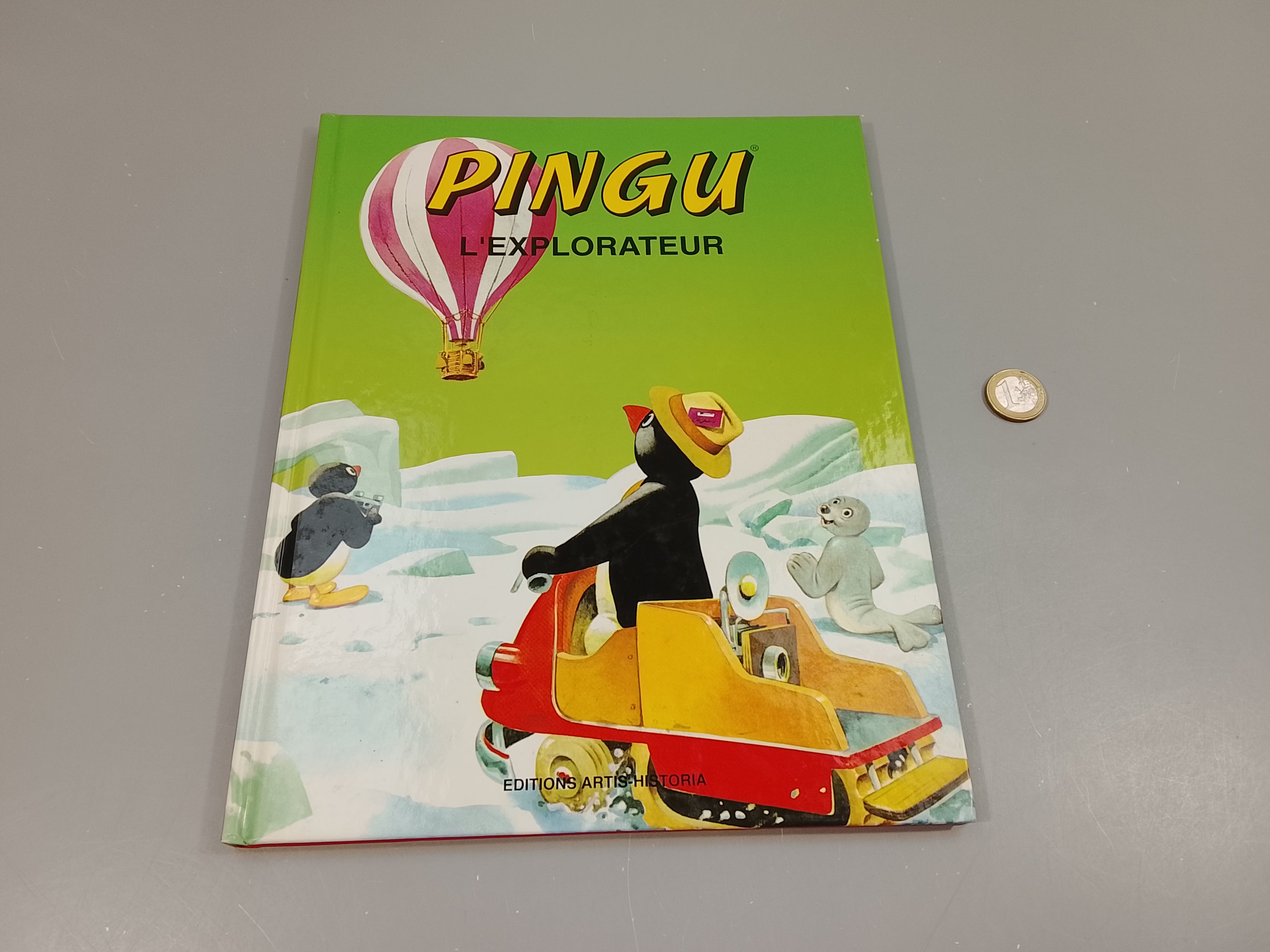 Pingu l'explorateur (certaines pages collantes dû aux autocollants)