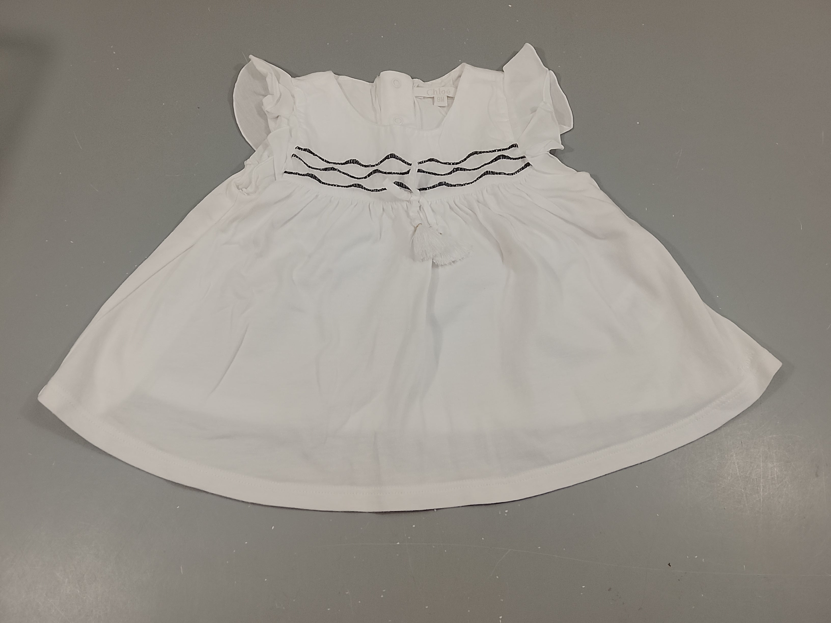 Blouse m.c Chloé blanche, vagues bleu marine