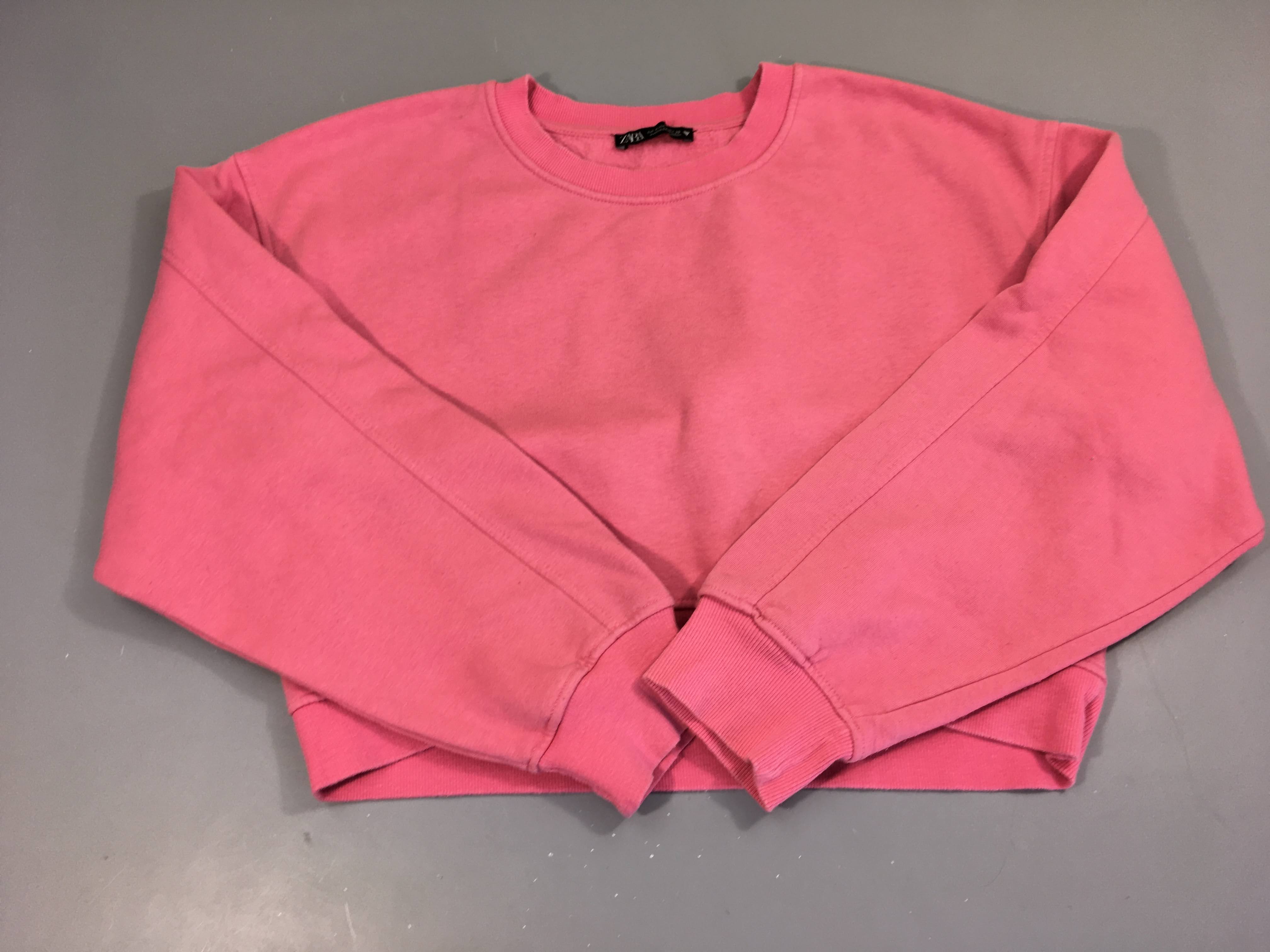 Sweat rose Légèrement bouloché