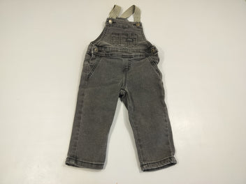 Salopette en jean noire , bretelles élastiques lignées noires et blanches 66% coton  28% polyester 3% viscose 3% élasthanne
