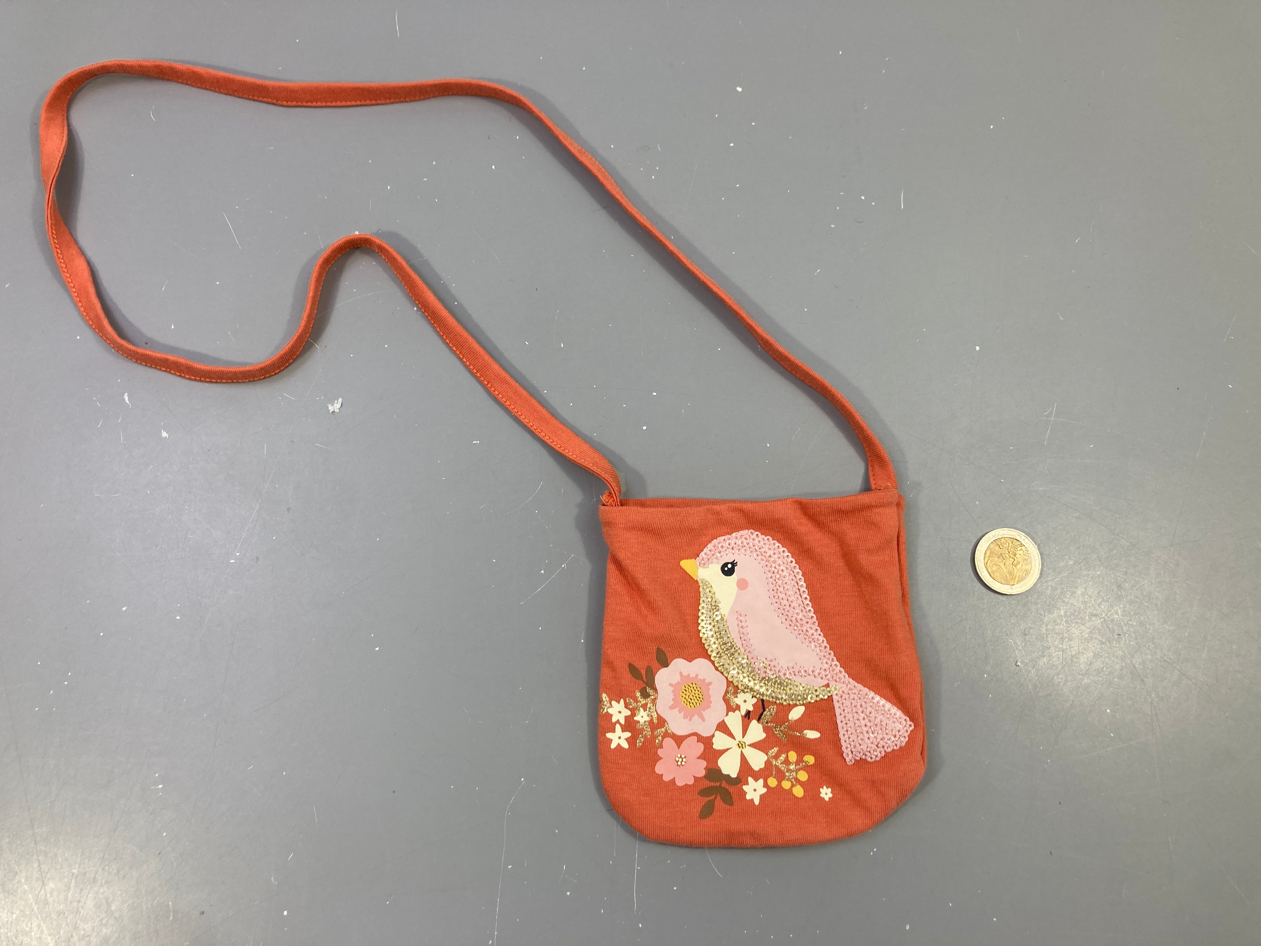 Petite pochette bandoulière textile orangée oiseau sequins