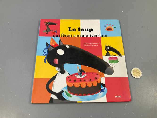 Le loup qui fêtait son anniversaire-couverture un peu usée, moins cher chez Petit Kiwi