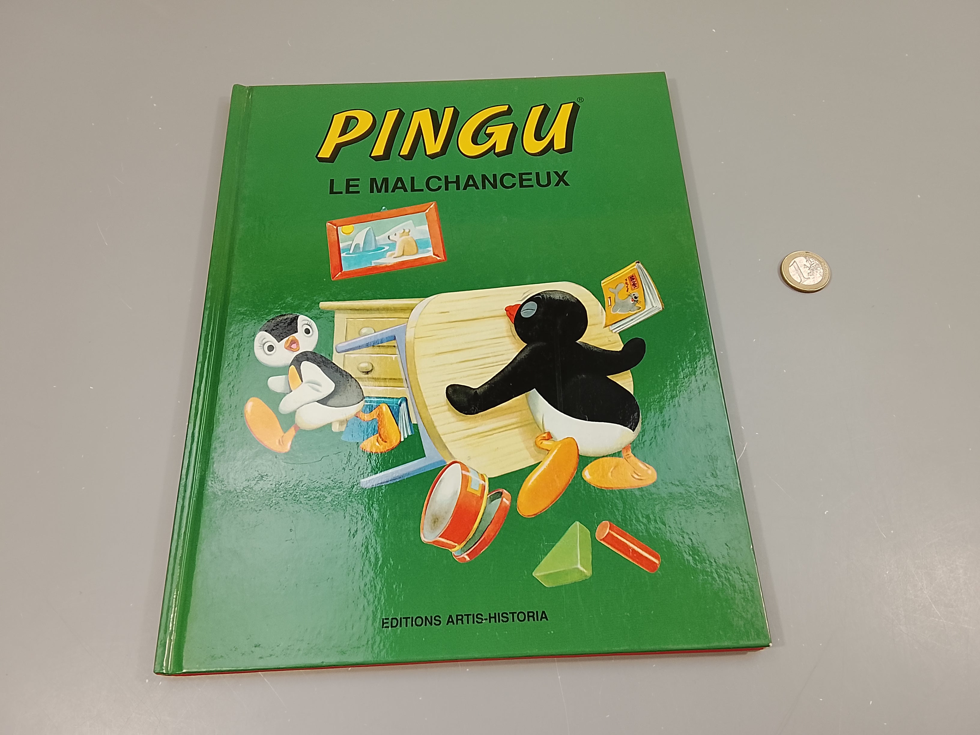 Pingu le malchanceux (certaines pages collantes dû aux autocollants)
