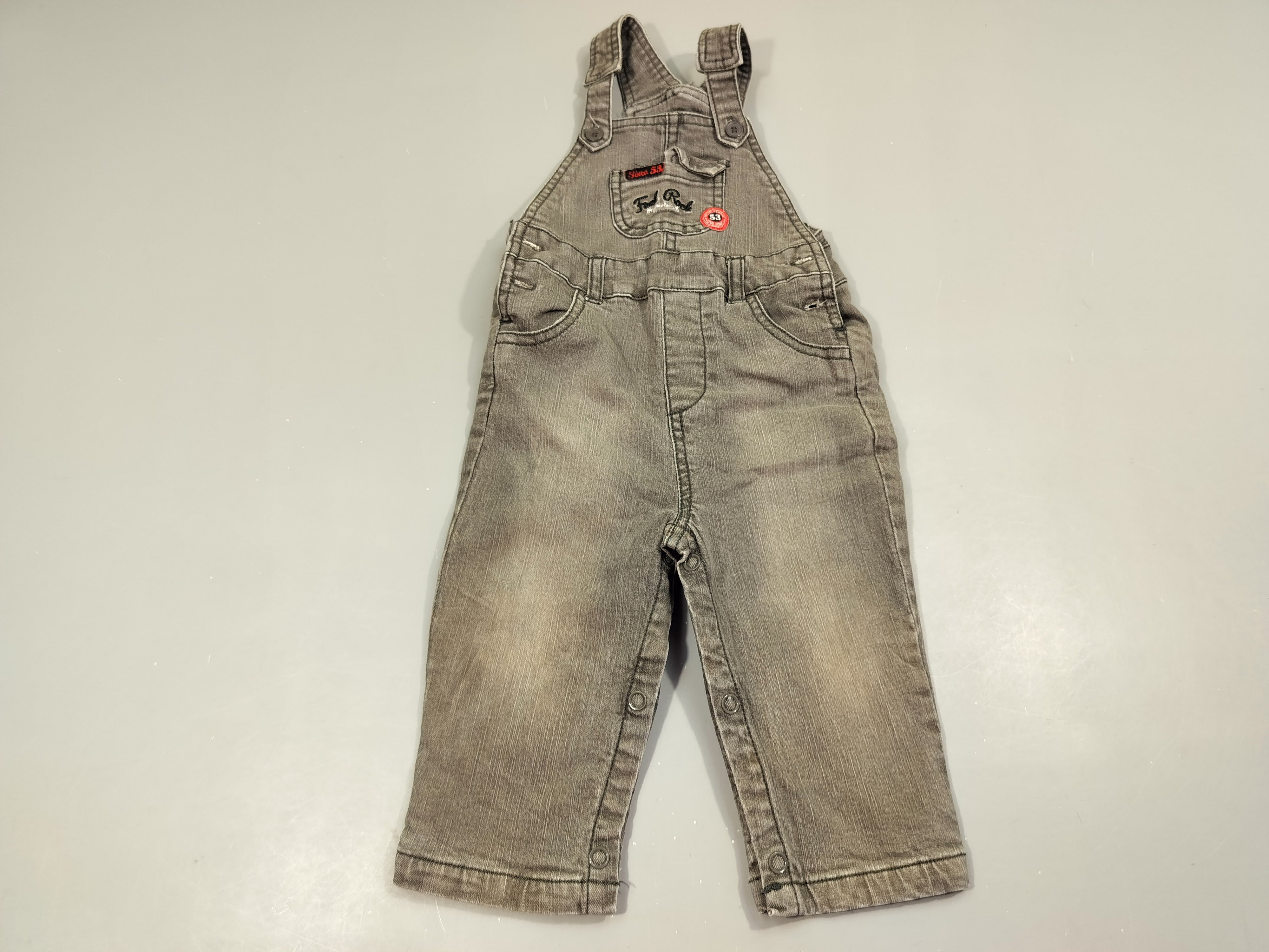 Salopette  en jean gris poche à l'avant 